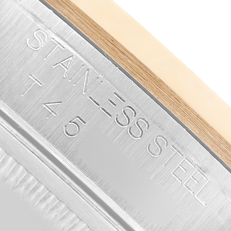The image shows a close-up of a Rolex Datejust 16203 Men's Stainless Steel Champagne Dial watch, highlighting the side engraving on the case edge.