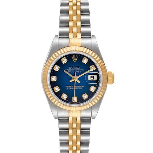 The Rolex Datejust 79173 Women's Stainless Steel Blue Dial watch is shown from a top-down angle, displaying the dial, fluted bezel, and two-tone Jubilee bracelet.