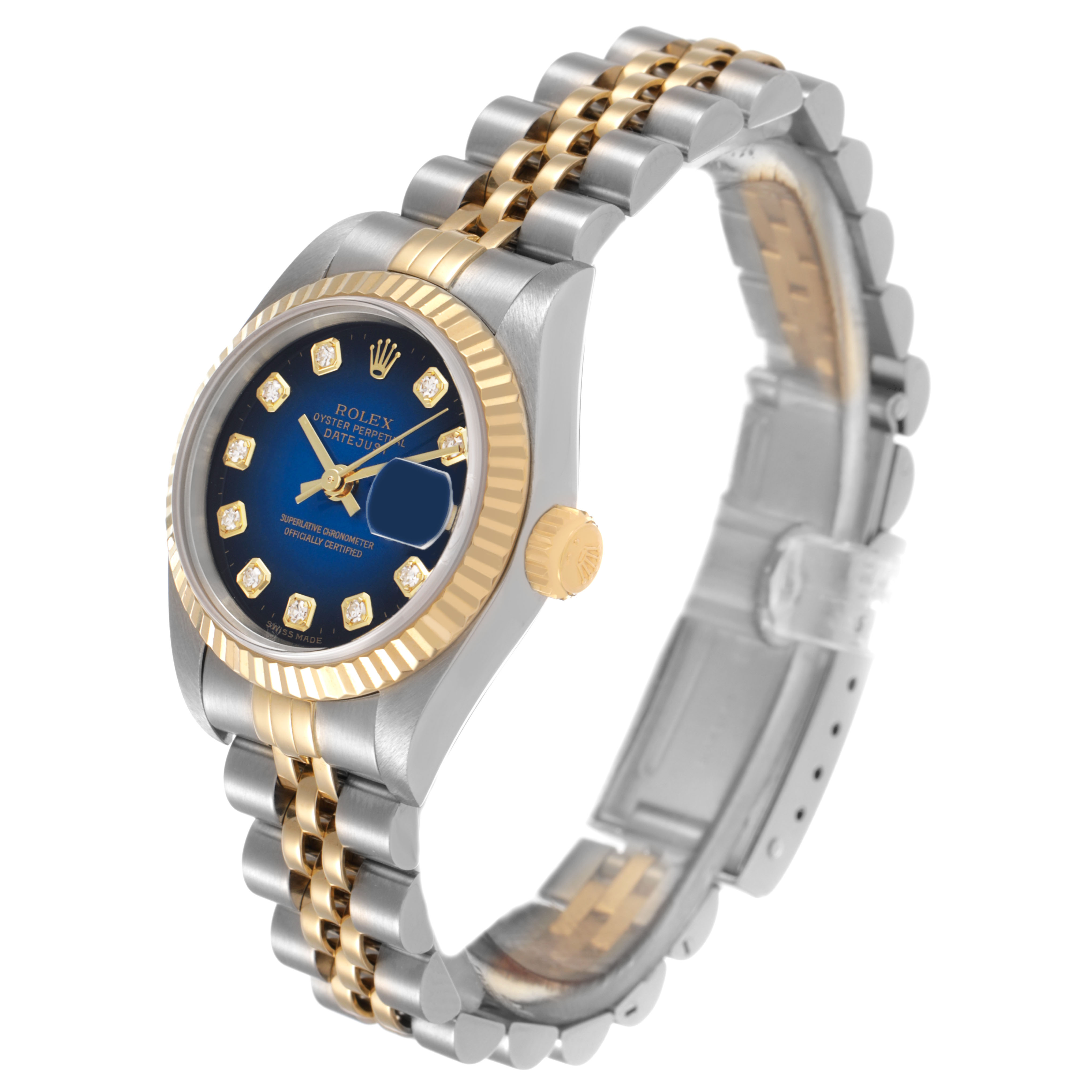 The Rolex Datejust 79173 Women's Stainless Steel Blue Dial watch is shown at a three-quarter angle, highlighting the bezel, crown, dial, and two-tone bracelet.