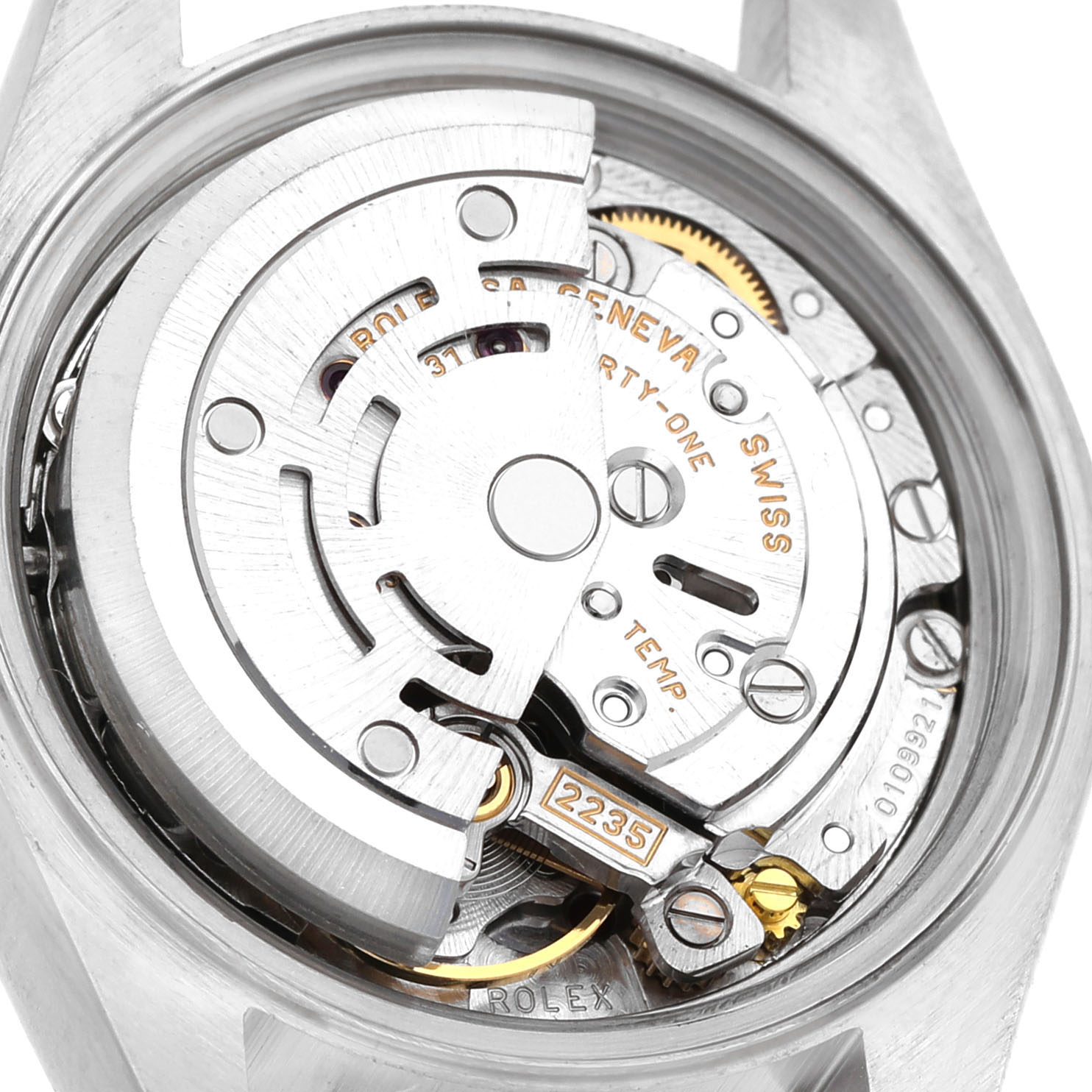 The image shows the back view of a Rolex Datejust 79173 Women's Stainless Steel Blue Dial, highlighting its mechanical movement and intricate components.