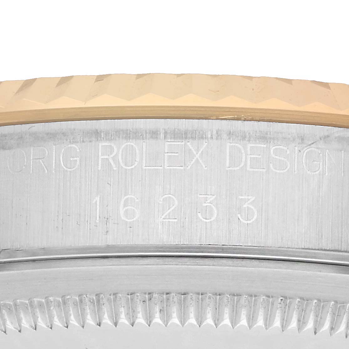 The image shows a close-up side view of a Rolex Datejust 16233 Men's Steel and Gold (two tone) White Dial model's case, highlighting the bezel and engraved reference number.