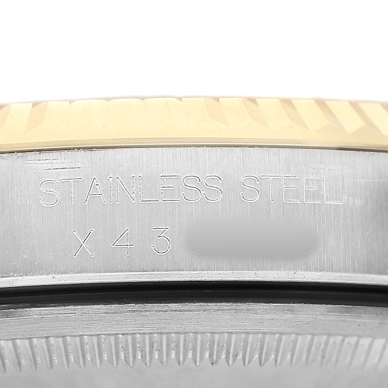 The image shows a close-up of the Rolex Datejust 16233 Men's Stainless Steel White Dial's side, focusing on the stainless steel body and engraved details.