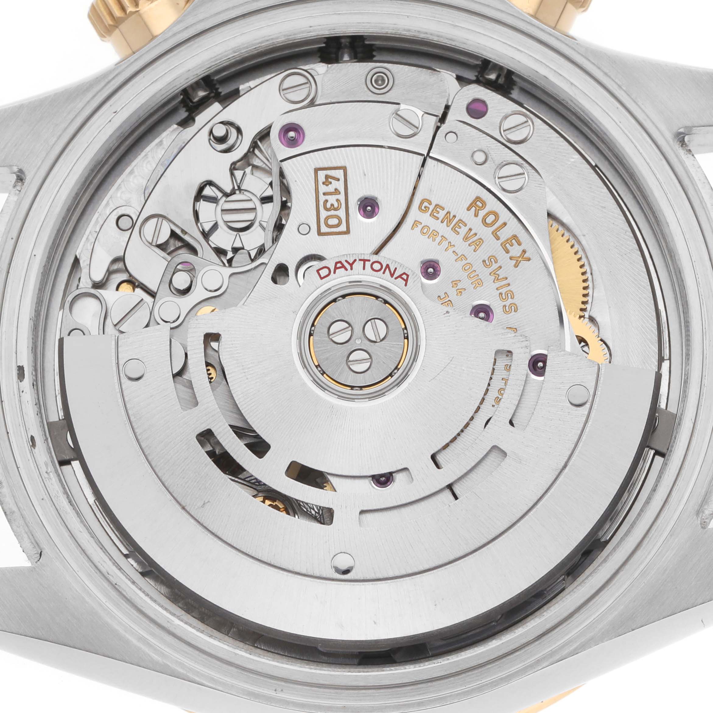 The image shows the movement of a Rolex Daytona 116503 Men's Steel and Gold (two tone) Blue Dial watch from a top-down angle, highlighting its intricate mechanical parts.