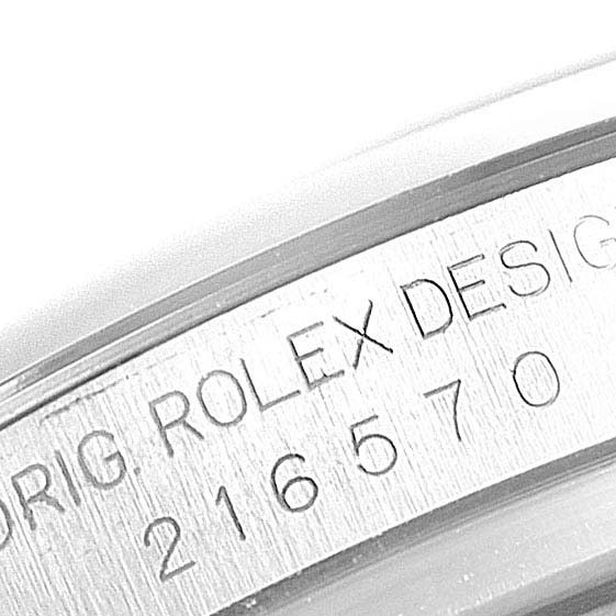This image shows the engraved serial number on the inner bezel of the Rolex Explorer 216570 Men
s Stainless Steel White Dial 216570 Men
s Stainless Steel White Dial watch.