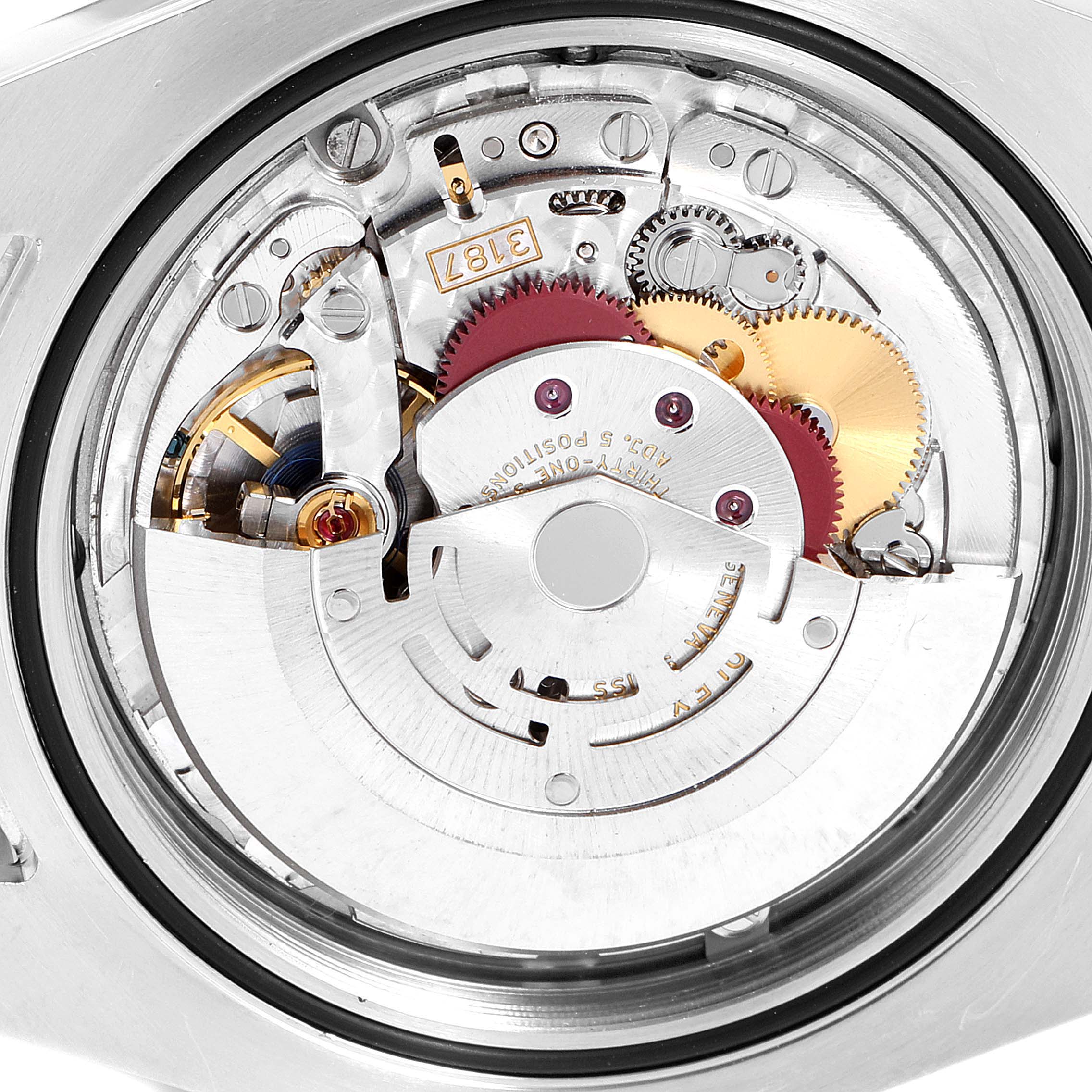 This image displays the inner mechanical movements and components of the Rolex Explorer 216570 Men
s Stainless Steel White Dial 216570 Men
s Stainless Steel White Dial watch from a close-up, top-down angle.