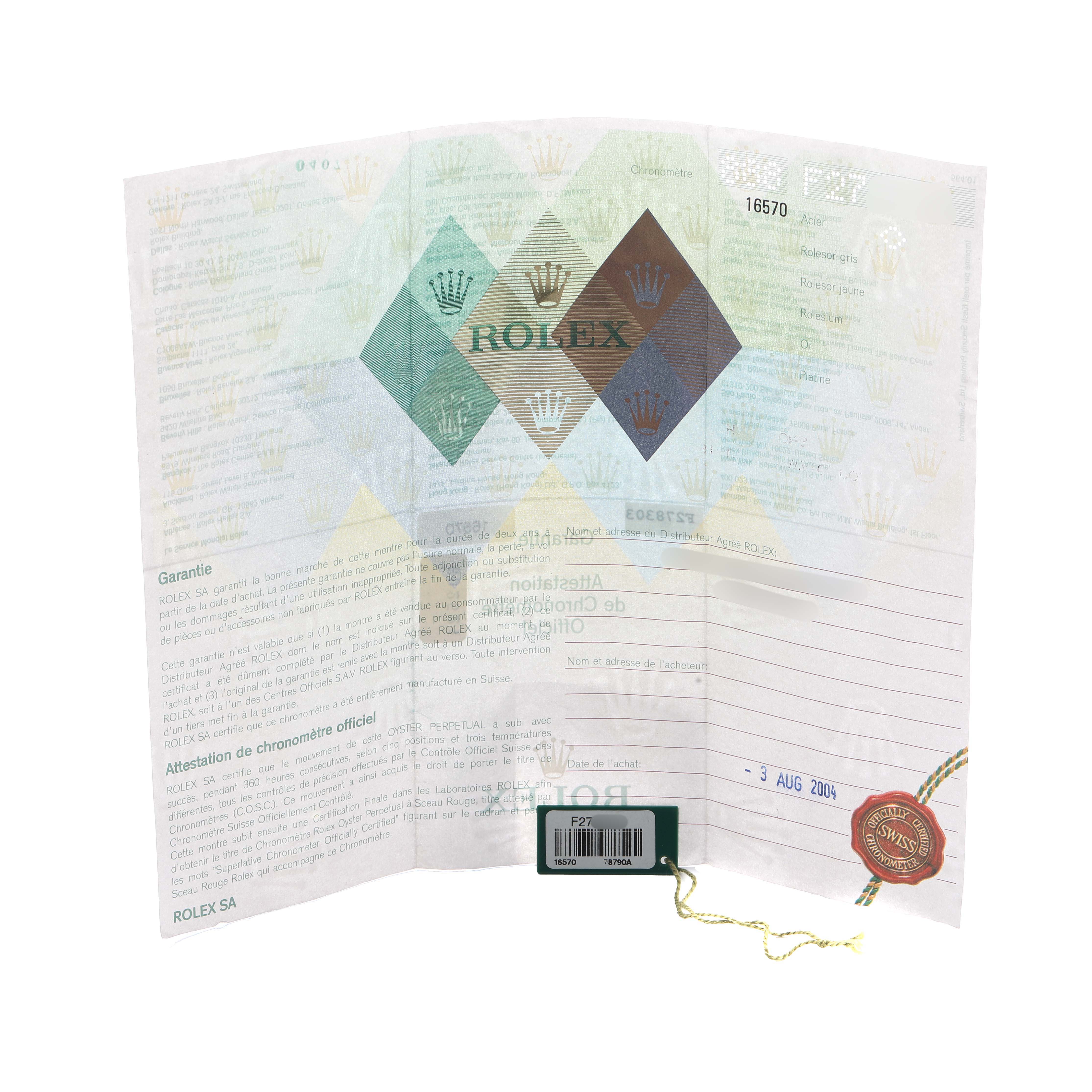 The image shows the guarantee and certificate paper for a Rolex Explorer 16570 Men's Stainless Steel White Dial model, featuring the brand logo and serial details.