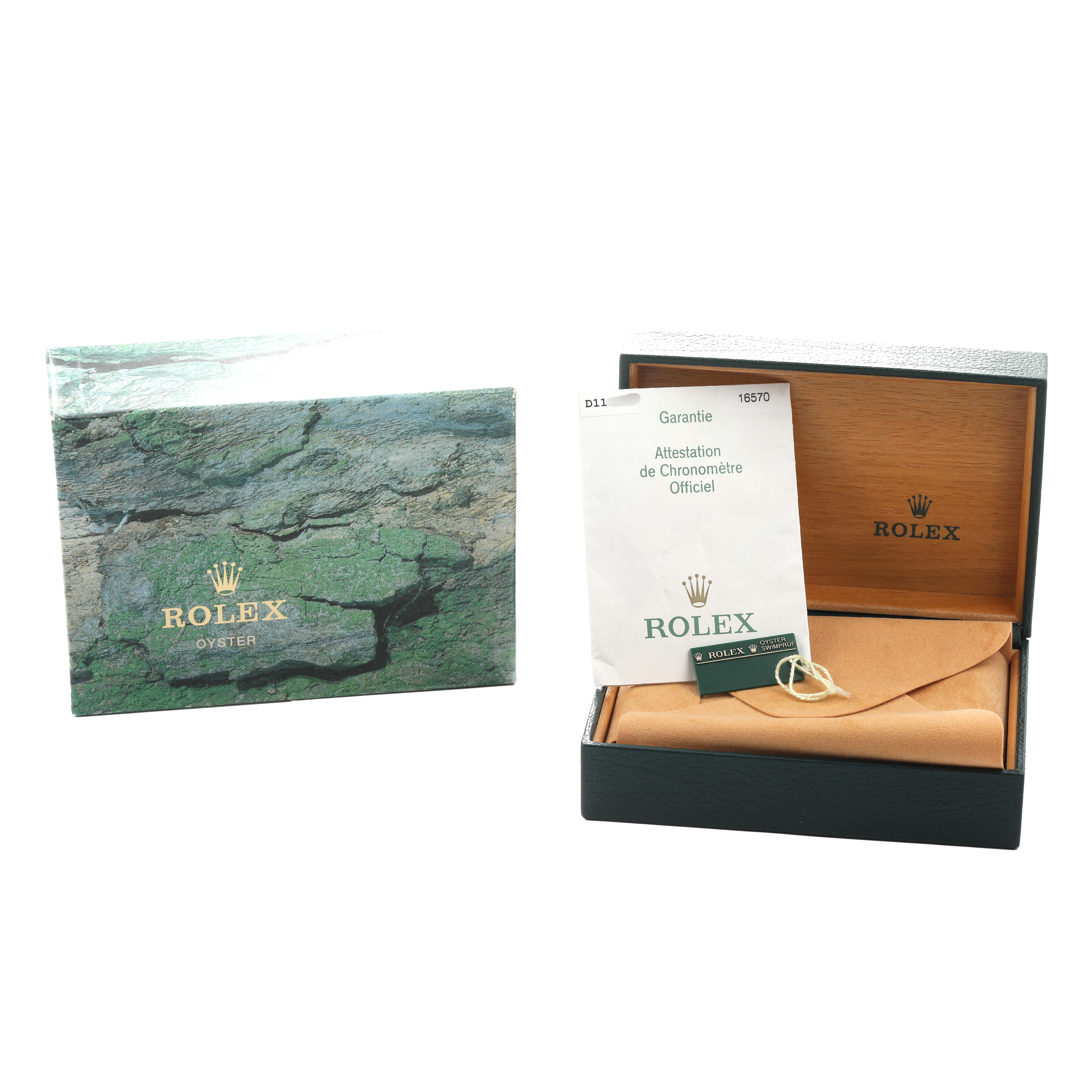 The image shows packaging and accessories for a Rolex Explorer 16570 Men's Stainless Steel White Dial, including a box, papers, and tags.