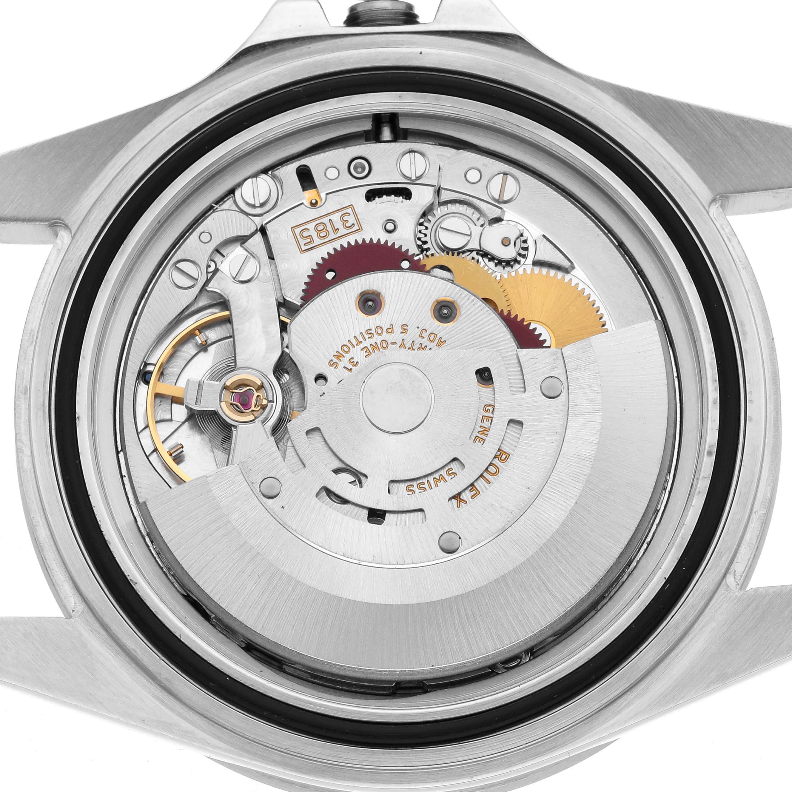 The image shows the Rolex Explorer 16570 Men's Stainless Steel White Dial model's case back removed, revealing its detailed mechanical movement components.