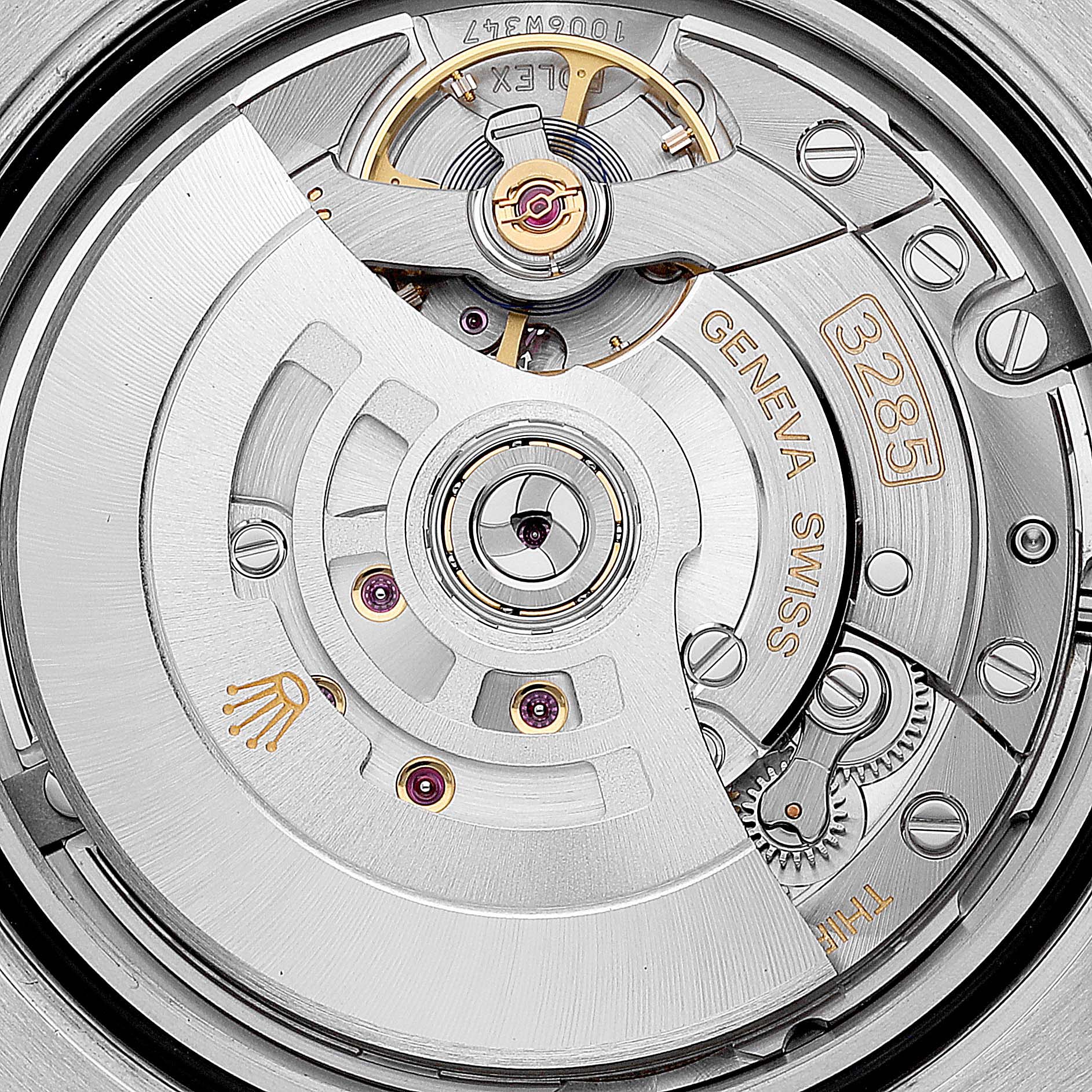 The image shows the movement mechanism of the Rolex GMT-Master 126710 Men
s Stainless Steel Black Dial 126710 Men
s Stainless Steel Black Dial, highlighting the caliber 3285 and intricate components.