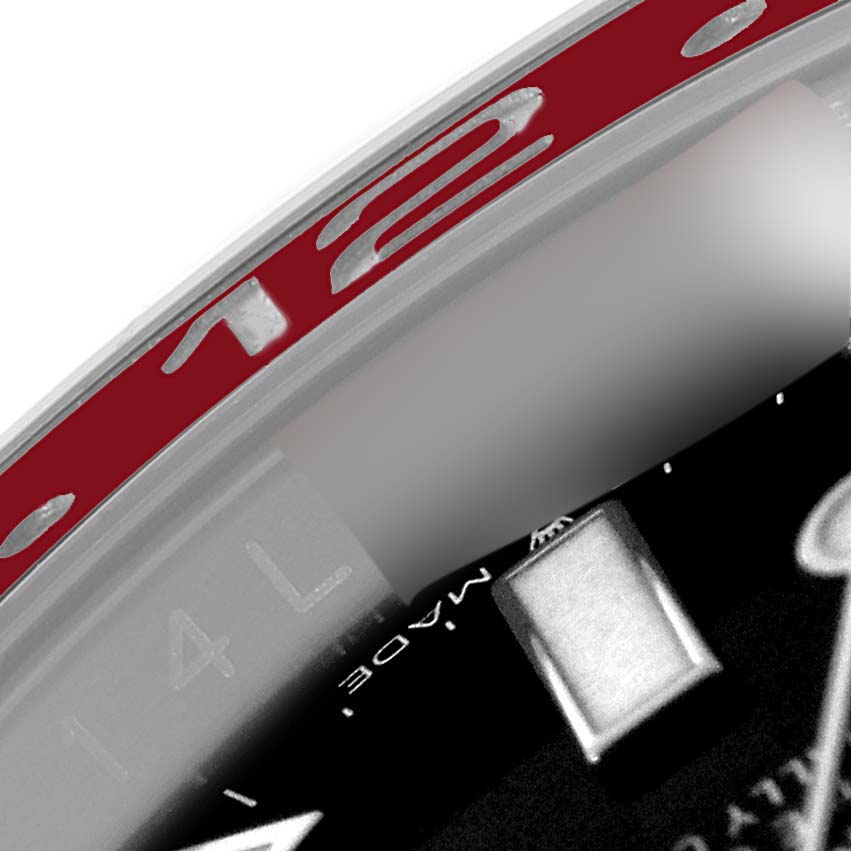 The image shows a close-up of the Rolex GMT-Master 126710 Men
s Stainless Steel Black Dial 126710 Men
s Stainless Steel Black Dial bezel and partial dial.