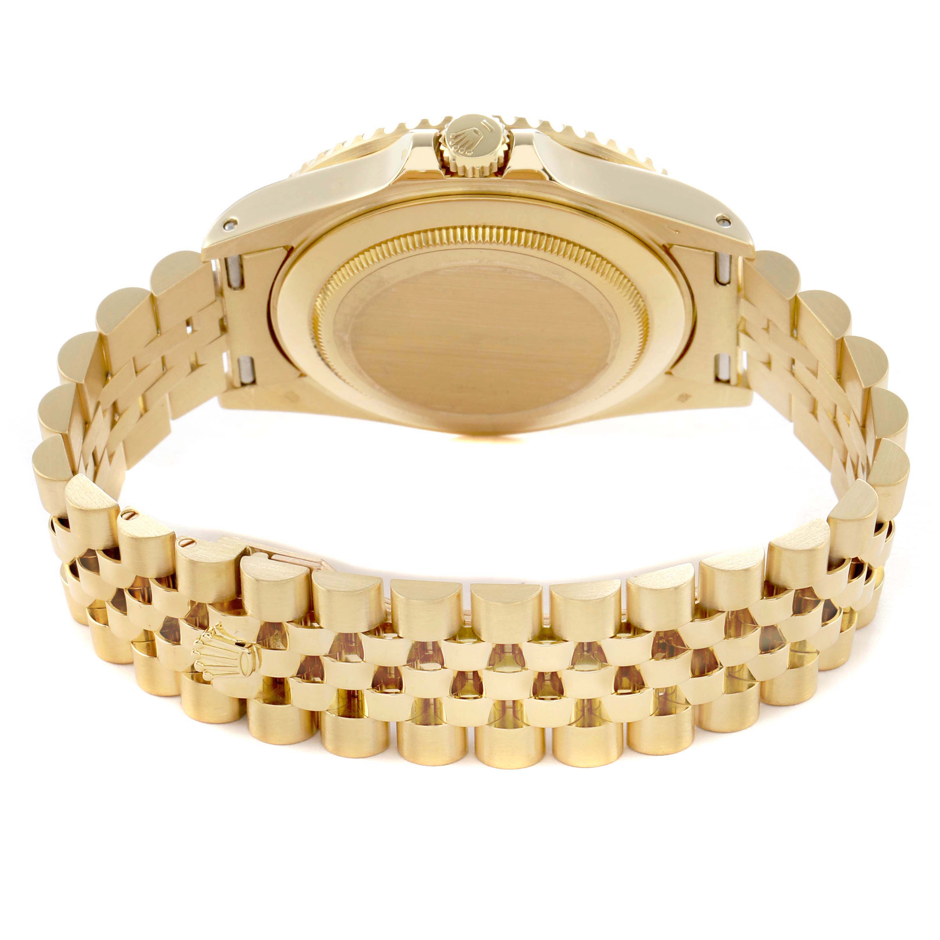 The image shows the back case and bracelet of a Rolex GMT-Master 16718 Men's Yellow Gold Brown Dial, viewed from a slightly elevated rear angle.