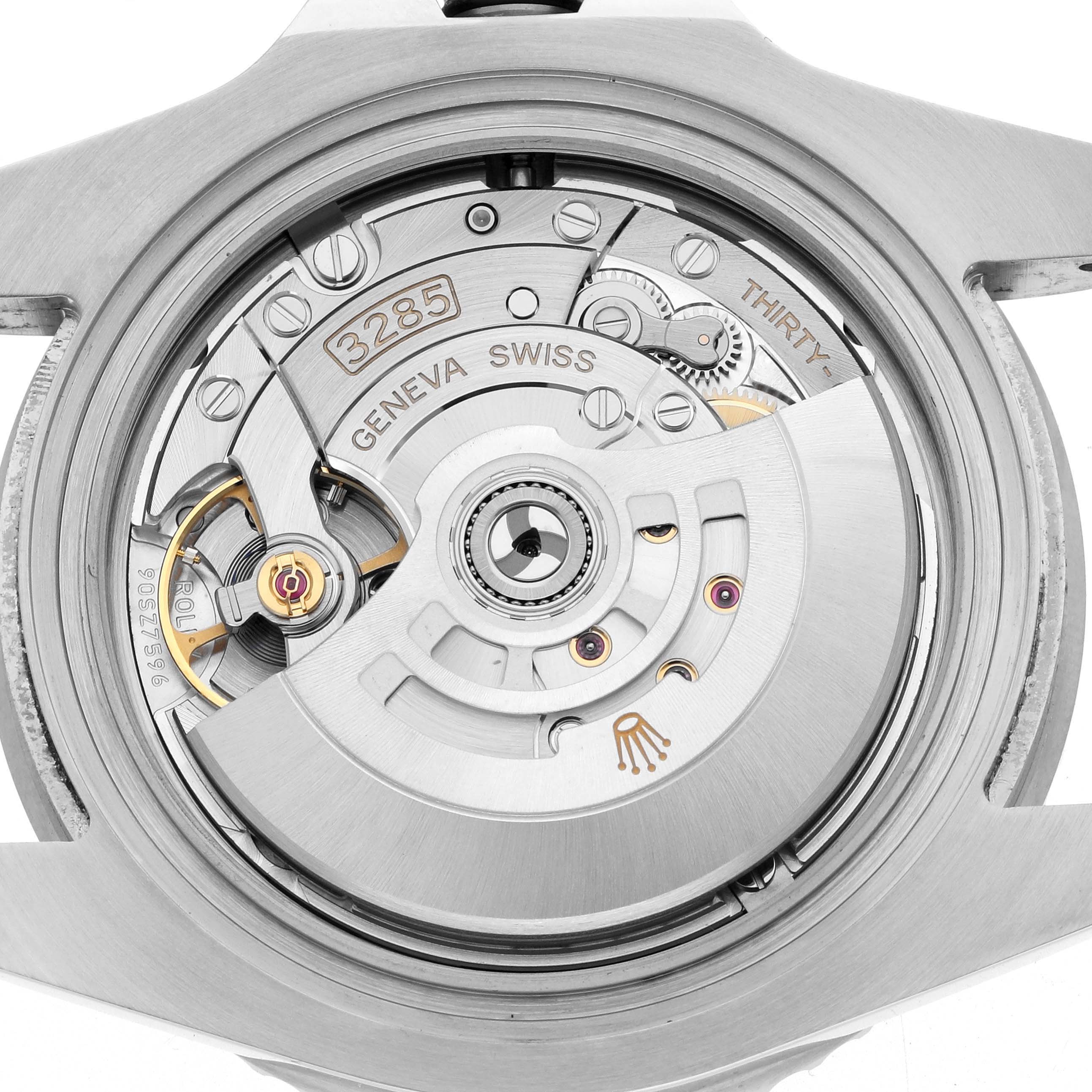 The image shows the back view of the Rolex GMT-Master 126710 Men's Stainless Steel Black Dial, revealing its intricate movement and internal components.