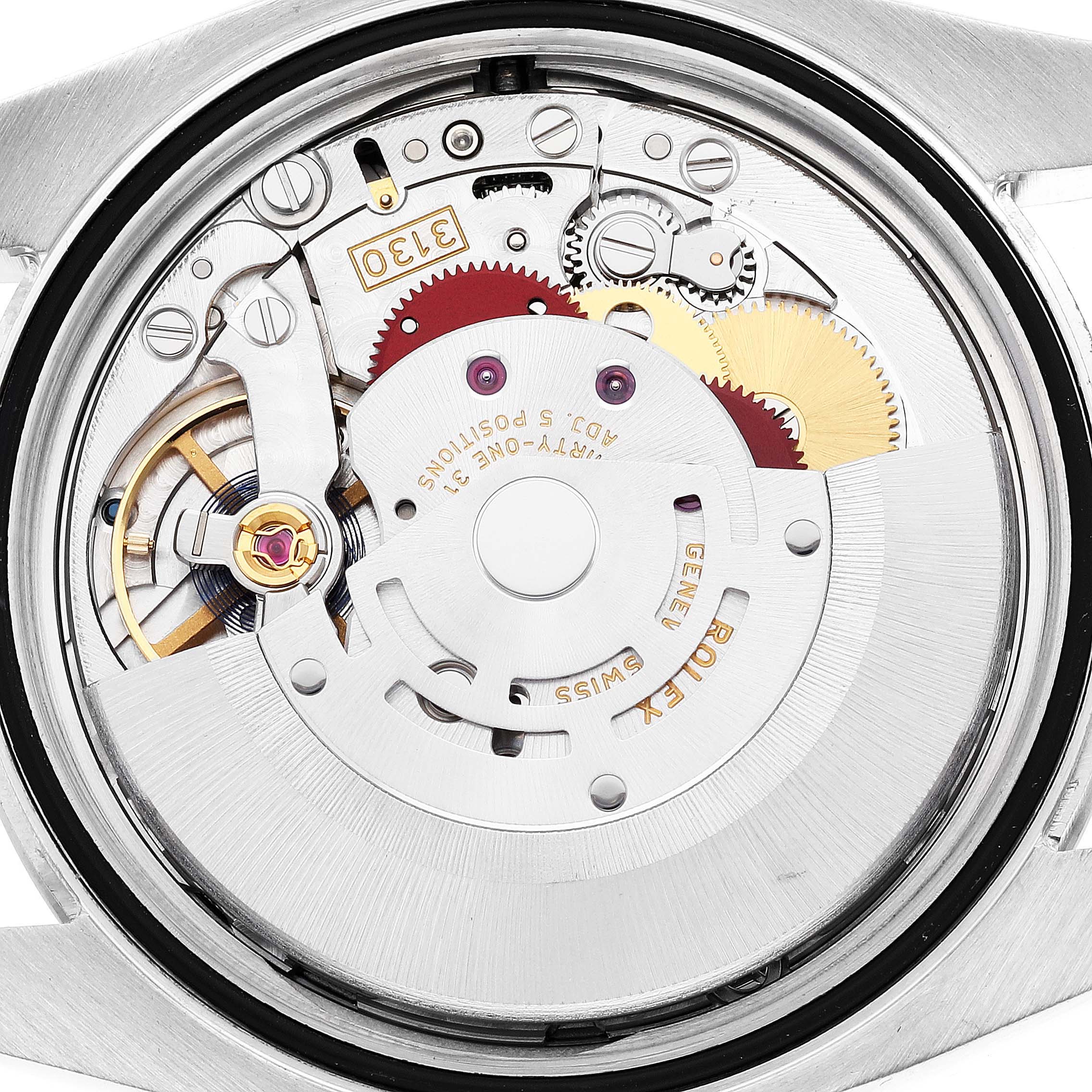 The image shows the open case back of a Rolex Oyster Perpetual 116000 Men's Stainless Steel Silver Dial 116000 Men's Stainless Steel Silver Dial, highlighting its movement and internal mechanical parts.