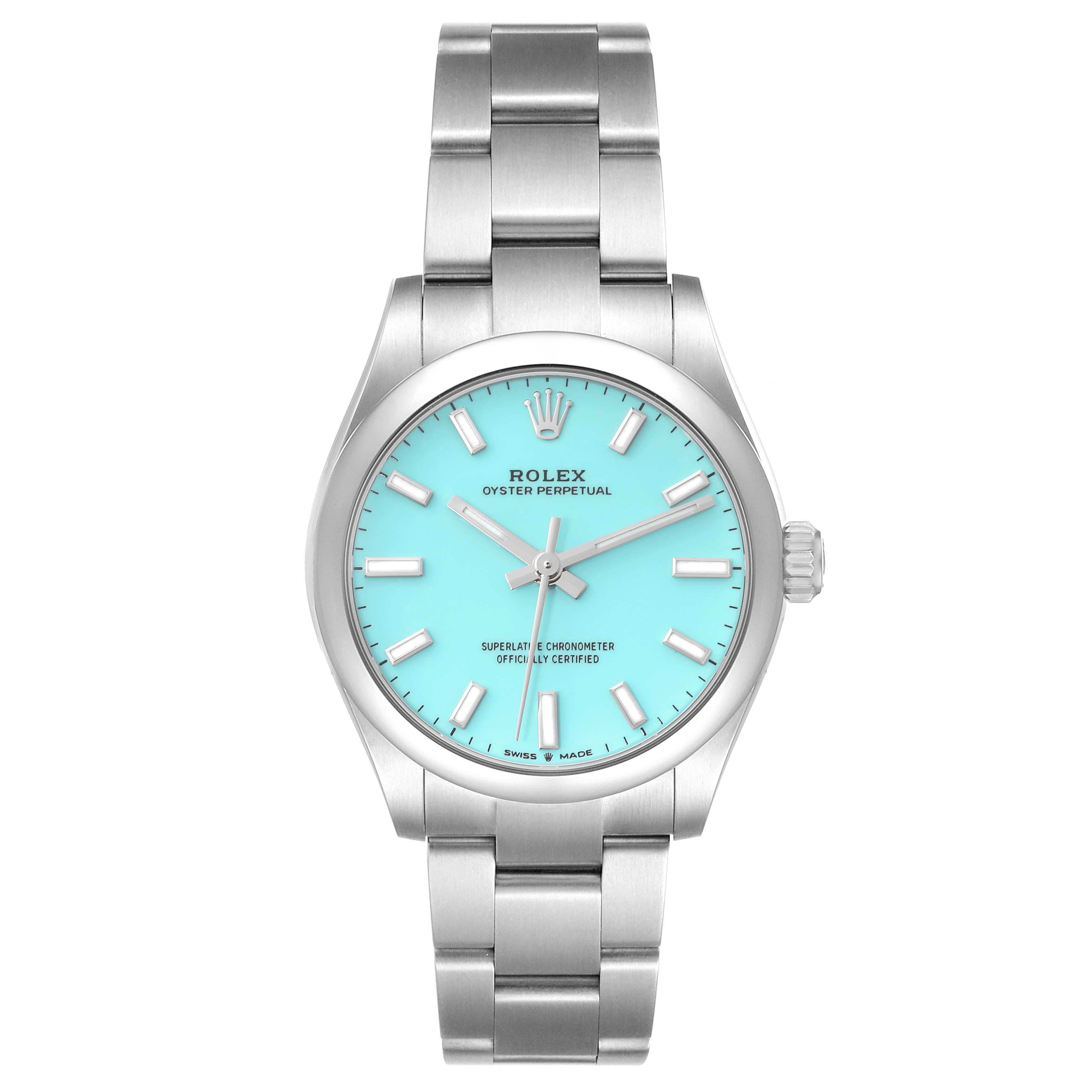 This image shows a frontal view of a Rolex Oyster Perpetual Mid-Size watch with a turquoise dial and stainless steel bracelet.