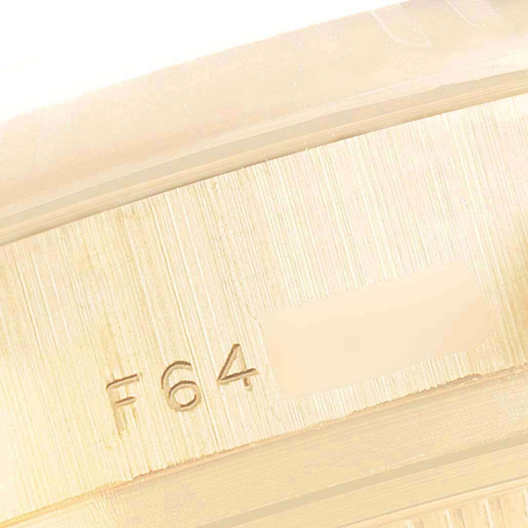 This image shows a close-up of the serial number engraved on the case back of a Rolex President 179178 Women's Yellow Gold White Dial 179178 Women's Yellow Gold White Dial model watch.