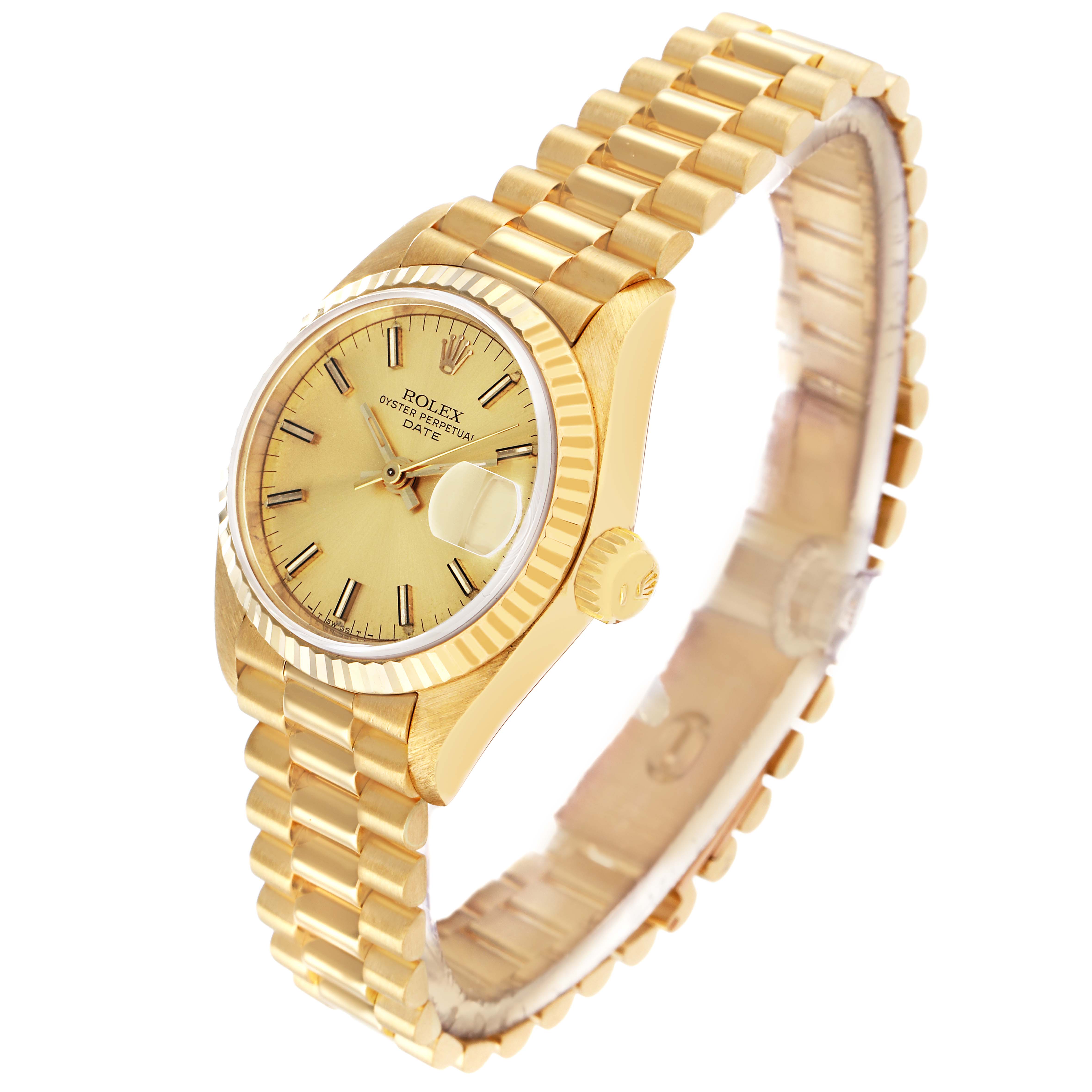 The Rolex President 69178 Women's Yellow Gold Champagne Dial watch is shown at a tilted angle, highlighting the gold case, fluted bezel, dial, and bracelet.