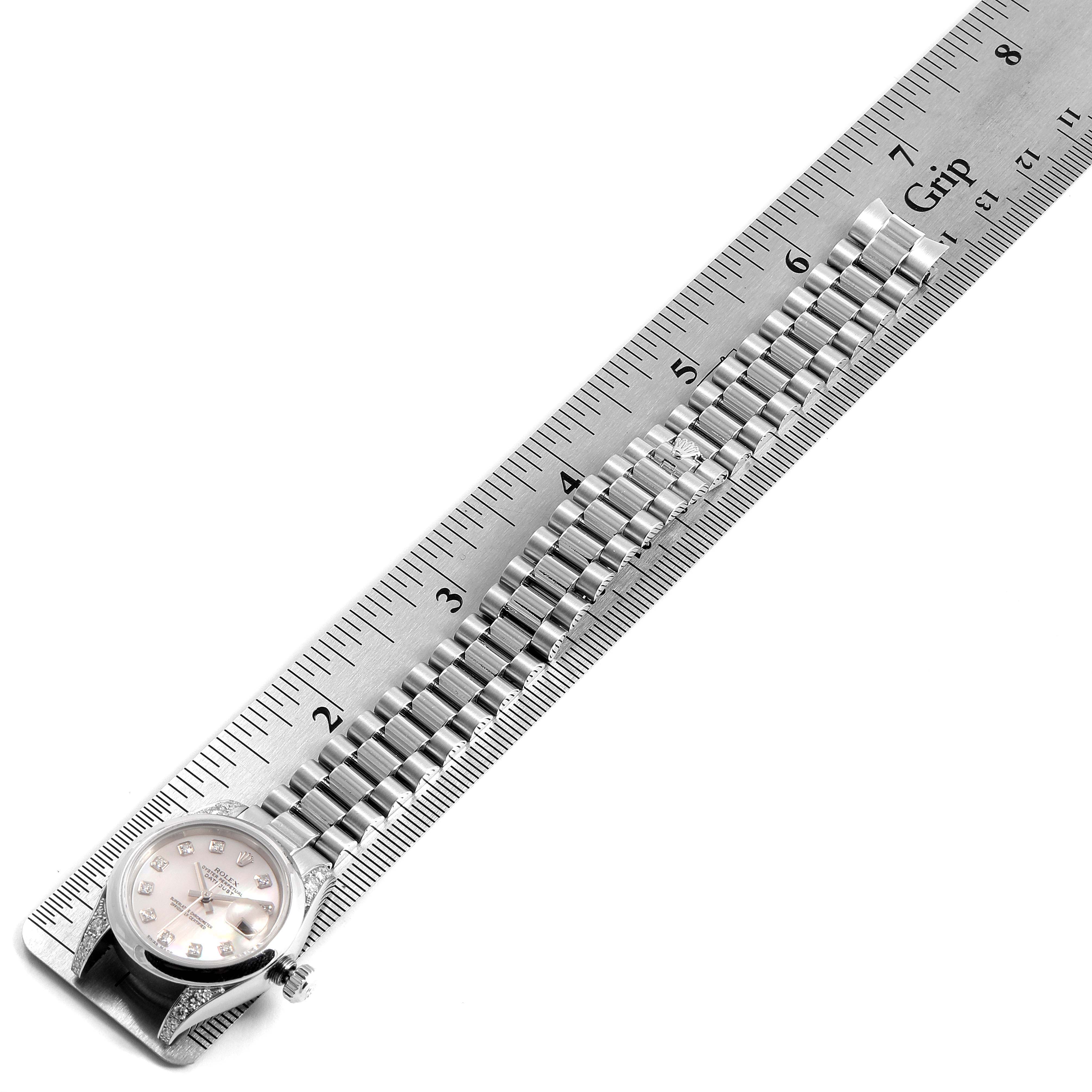 The image shows a side view of a Rolex President 179296 Women's Platinum Mother of Pearl Dial 179296 Women's Platinum Mother of Pearl Dial model watch with its band measured with a ruler.