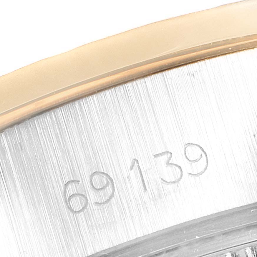 This is a close-up image of the case side showing the model number "69139" of a Rolex President 69139 Women's Yellow Gold Mother of Pearl Dial 69139 Women's Yellow Gold Mother of Pearl Dial watch.