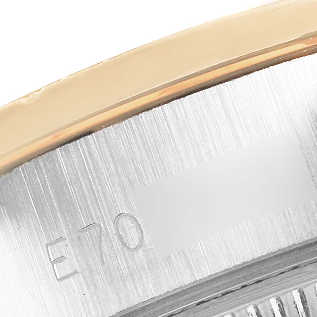 This close-up image shows the side casing of a Rolex President 69139 Women's Yellow Gold Mother of Pearl Dial 69139 Women's Yellow Gold Mother of Pearl Dial model watch, displaying part of the reference number.
