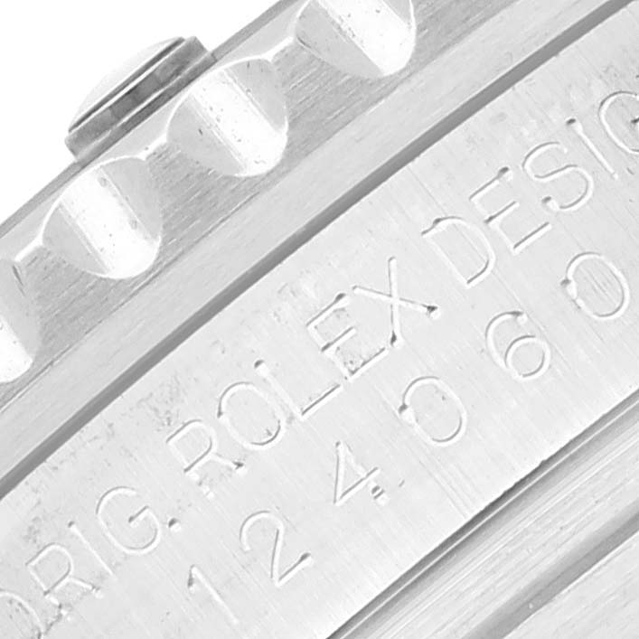 The image shows a close-up of the engraved side of the Rolex Submariner 124060 Men
s Stainless Steel Black Dial 124060 Men
s Stainless Steel Black Dial watch bezel and crown.