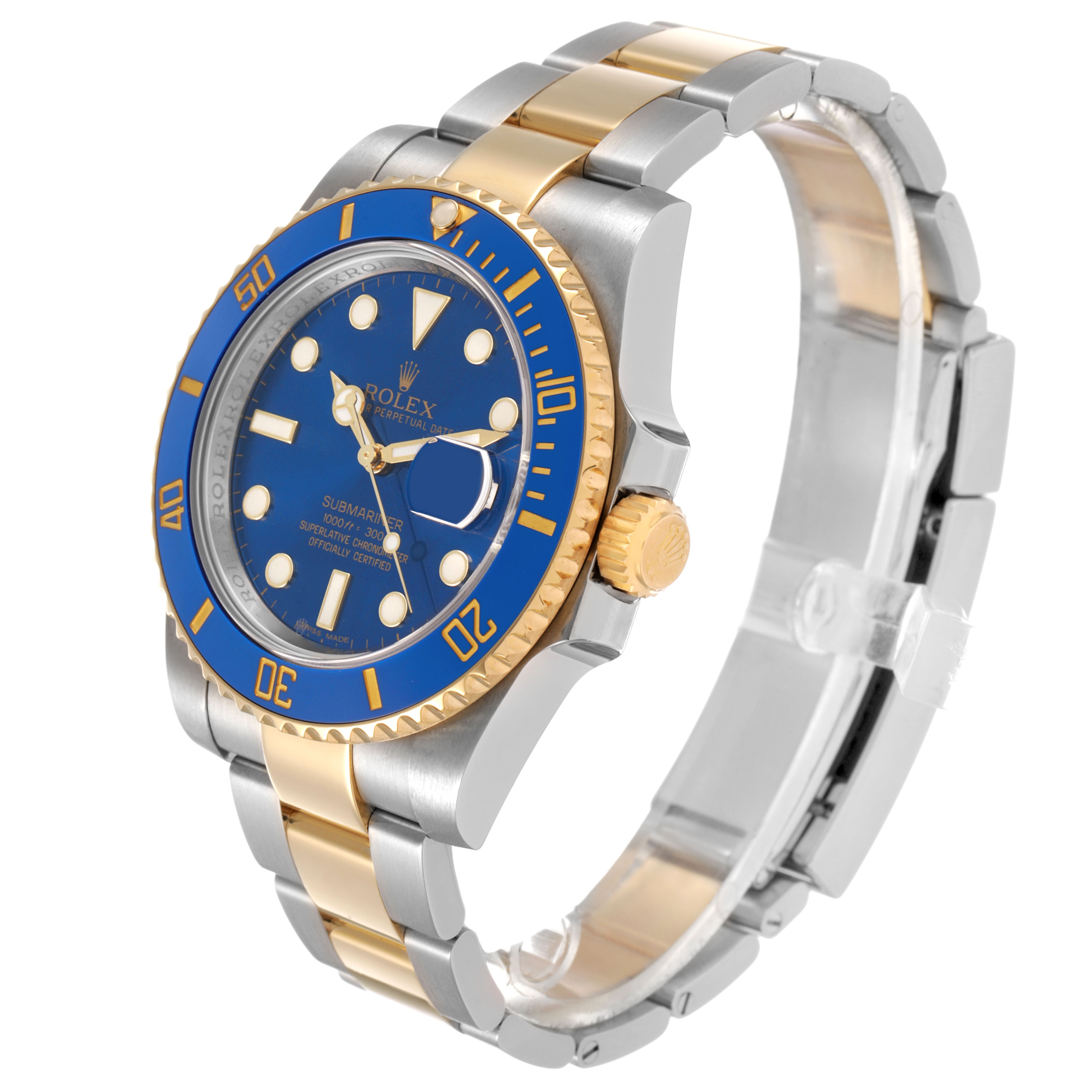 The Rolex Submariner 116613 Men's Steel and Gold (two tone) Blue Dial watch is shown at a three-quarter angle, highlighting the blue dial, bezel, crown, and two-tone bracelet.