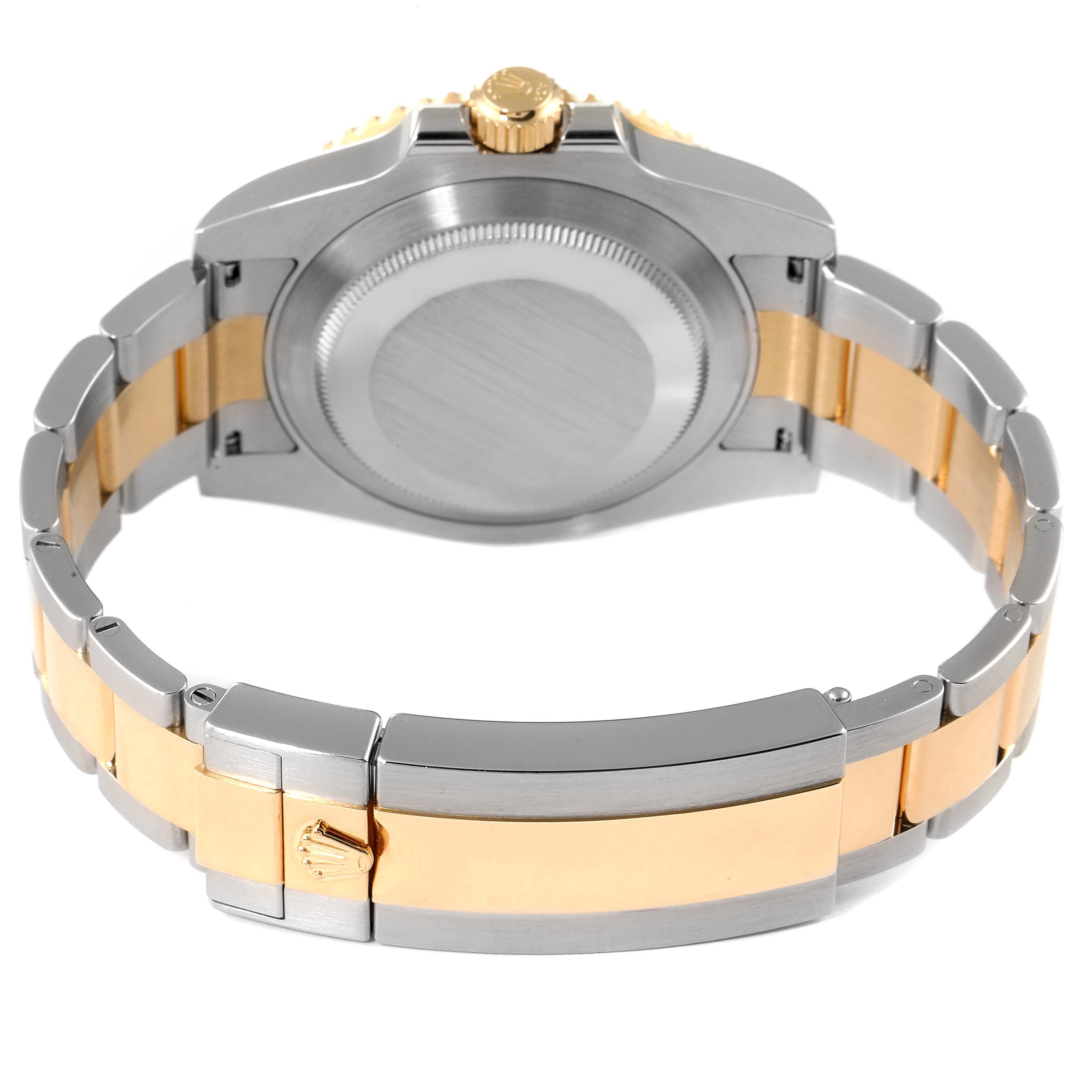 This image shows the back side and bracelet of a Rolex Submariner 116613 Men's Steel and Gold (two tone) Blue Dial 116613 Men's Steel and Gold (two tone) Blue Dial, highlighting the two-tone design and clasp.