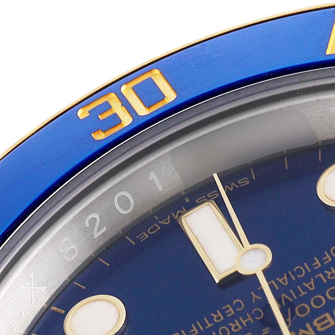 The image shows a close-up of the blue bezel and part of the dial of a Rolex Submariner 116613 Men's Steel and Gold (two tone) Blue Dial 116613 Men's Steel and Gold (two tone) Blue Dial watch.