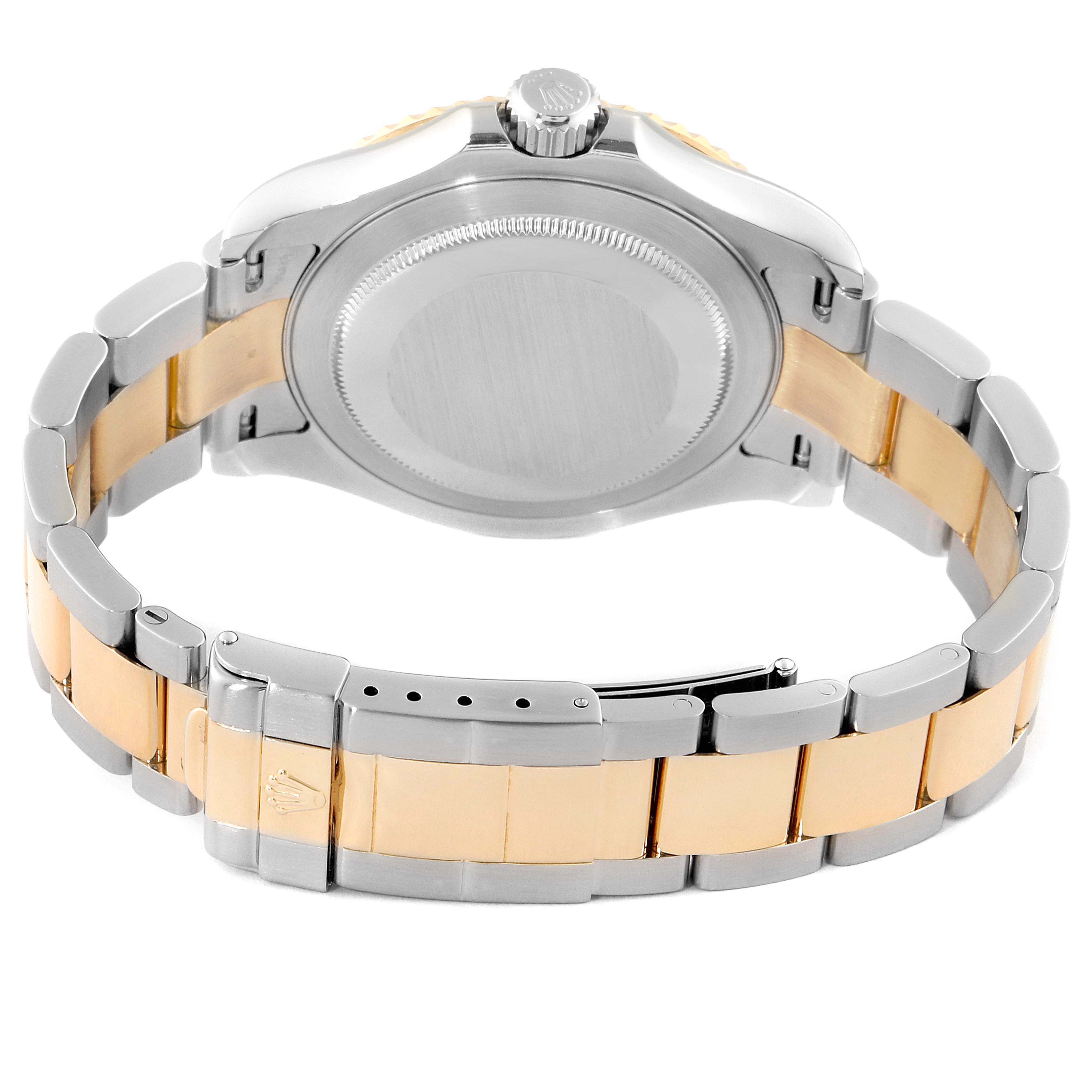 The image shows the back and bracelet of a Rolex Yacht-Master 16623 Men
s Steel and Gold (two tone) Blue Dial 16623 Men
s Steel and Gold (two tone) Blue Dial watch, highlighting its two-tone metal design and clasp.