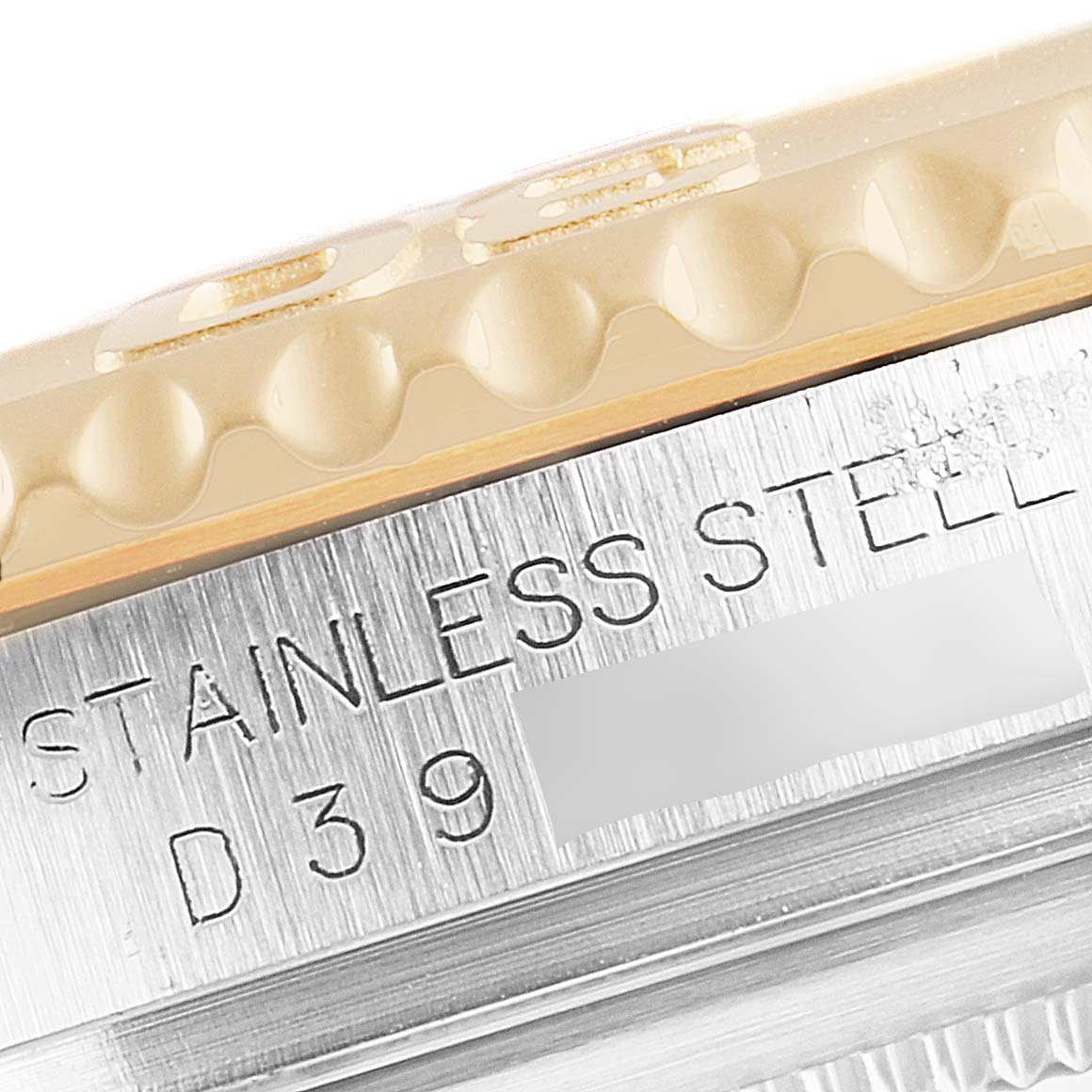 Close-up of a Rolex Yacht-Master 16623 Men
s Steel and Gold (two tone) Blue Dial 16623 Men
s Steel and Gold (two tone) Blue Dial, showing the stainless steel case with part of the bezel visible.