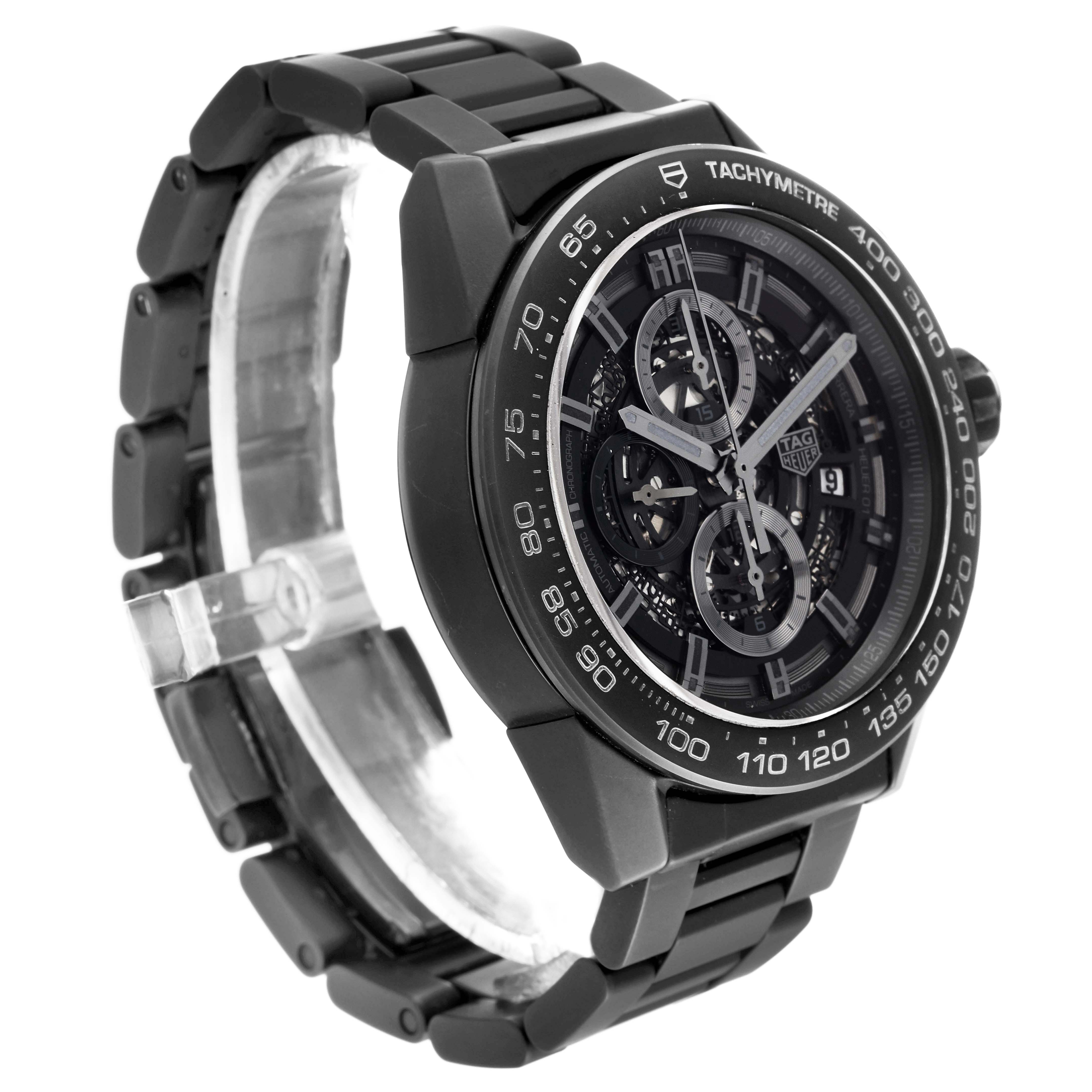 This image shows a side view of the black Carrera model by Tag Heuer, highlighting the bracelet and face with tachymetre markings.