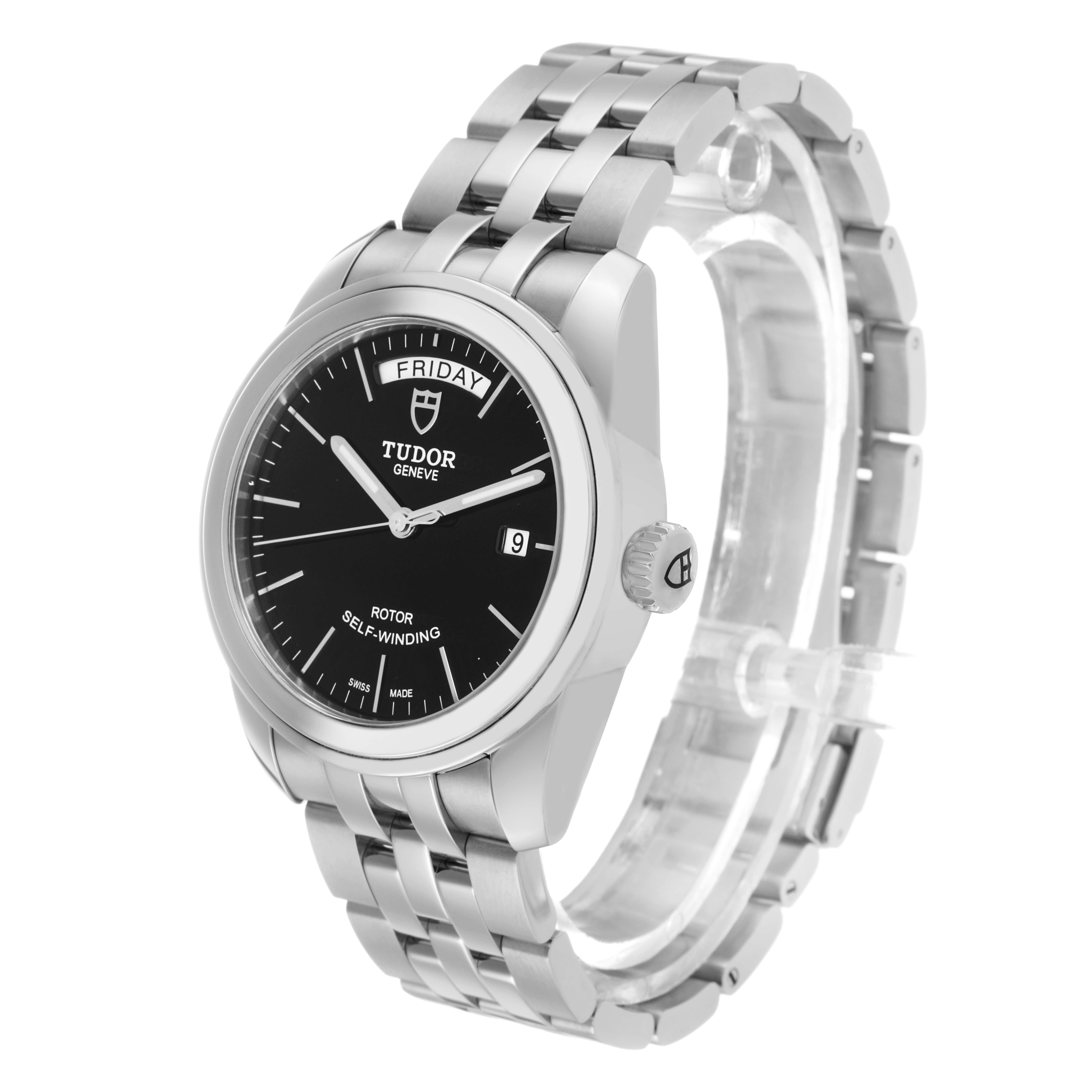 The Tudor Glamour 56000 Men's Stainless Steel Black Dial model watch is shown at a 3/4 angle, highlighting the face, bezel, bracelet, and crown.