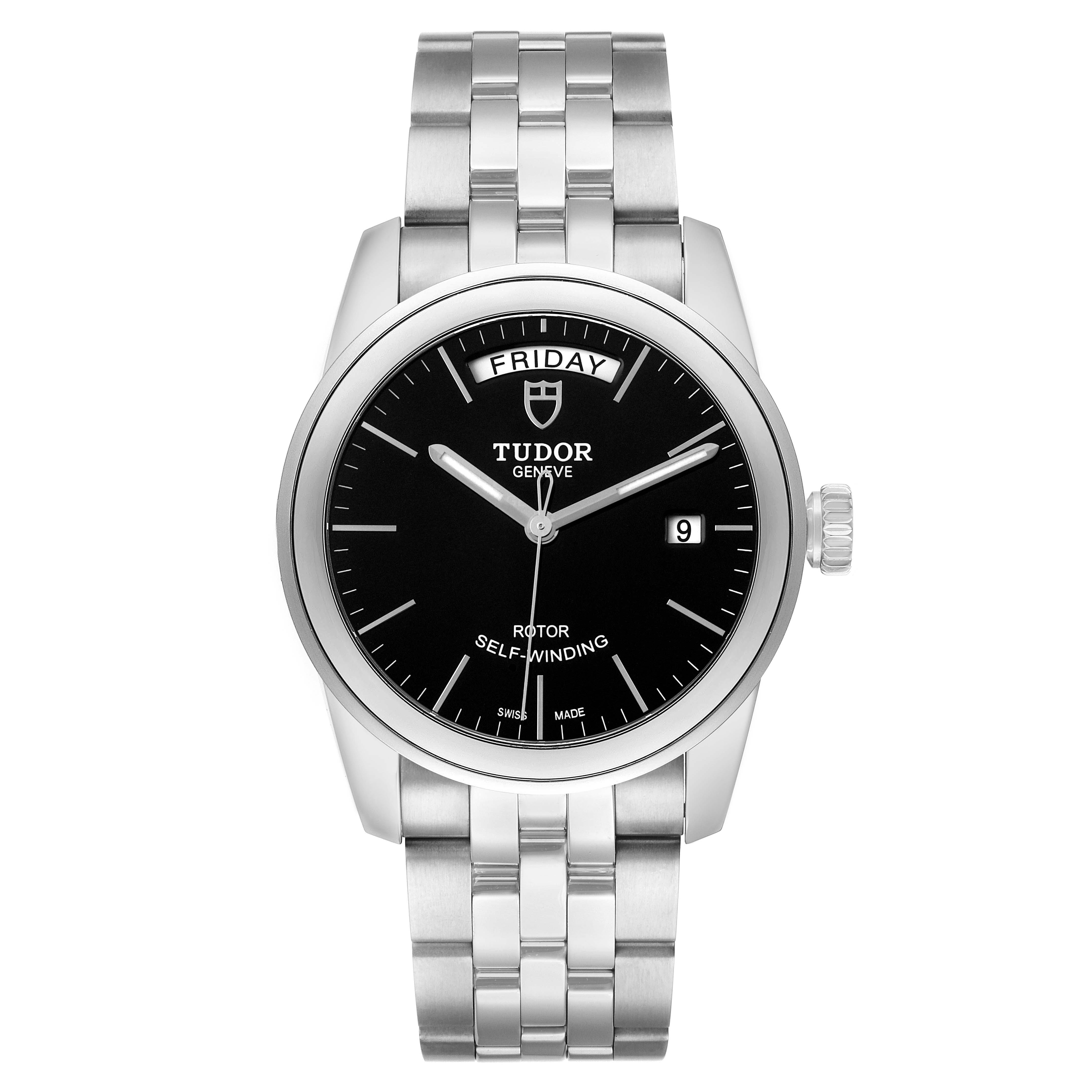 The Tudor Glamour 56000 Men's Stainless Steel Black Dial watch is shown from the front, featuring its black dial, day-date display, and silver bracelet.