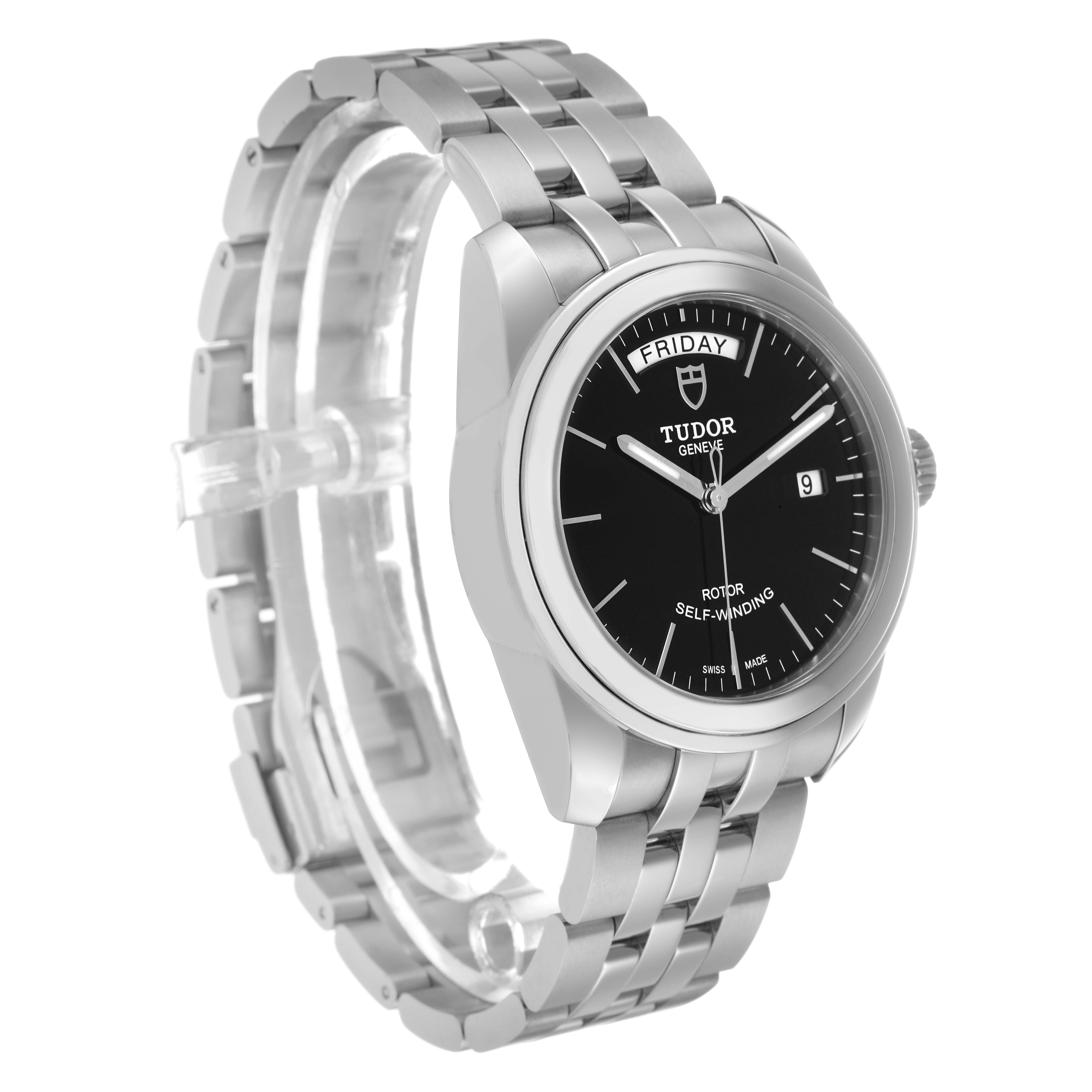 The Tudor Glamour 56000 Men's Stainless Steel Black Dial watch is shown at a three-quarter angle, highlighting the bracelet, case, and black dial.