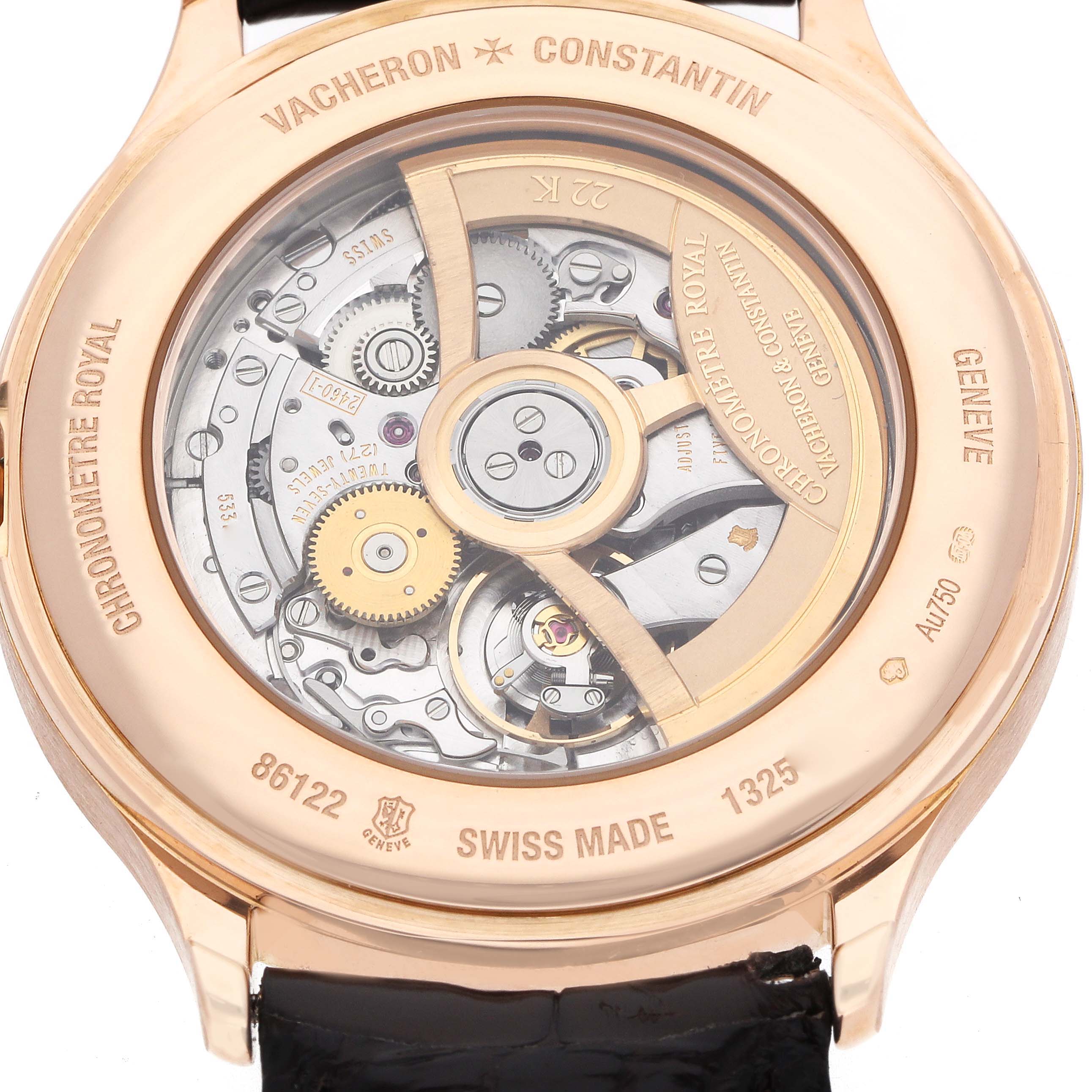 The image shows the back of a Vacheron Constantin Historiques 86122 Men's Rose Gold White Dial watch, highlighting its intricate mechanical movement through a transparent case back.