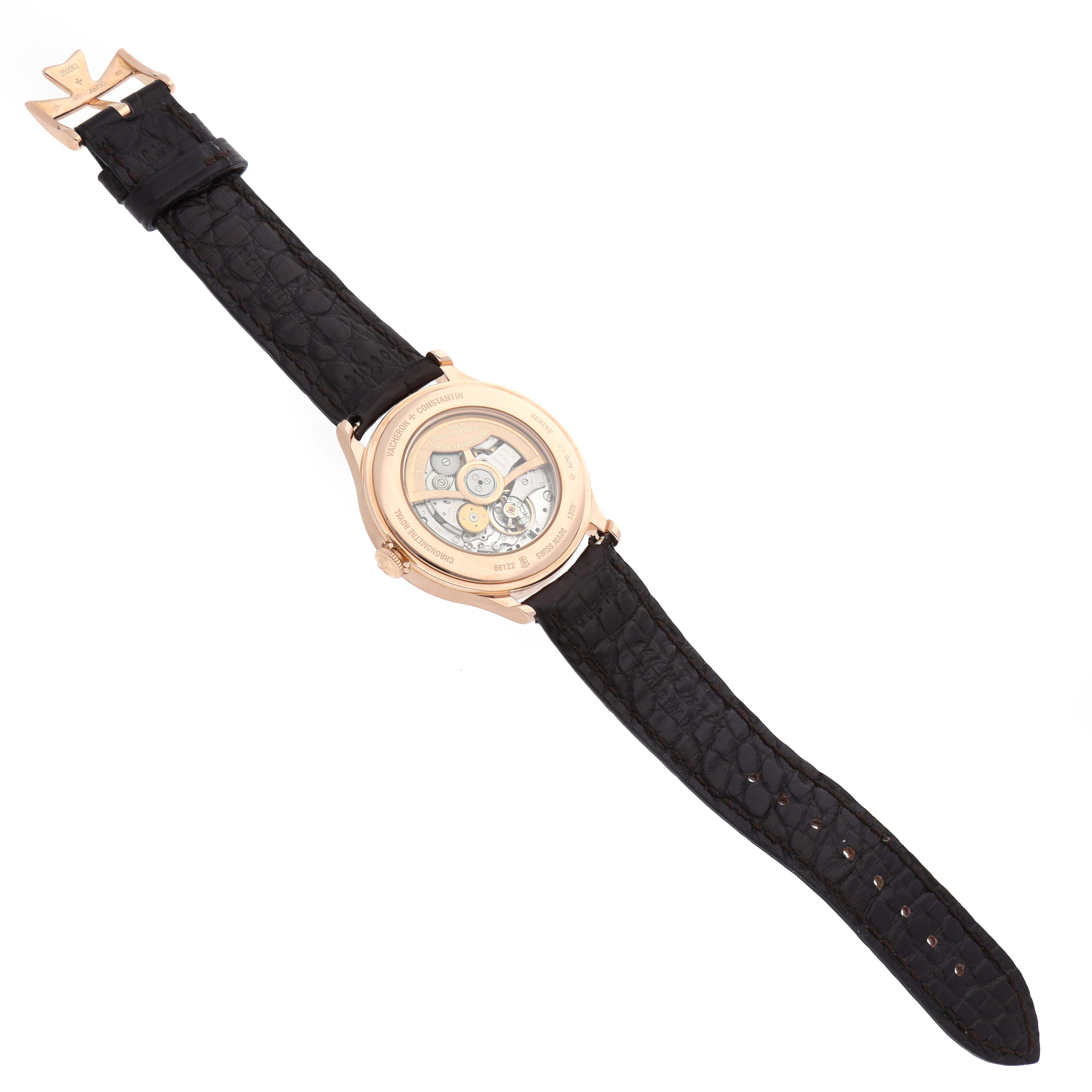 The Vacheron Constantin Historiques 86122 Men's Rose Gold White Dial watch is shown from the back, displaying its movement and leather strap.