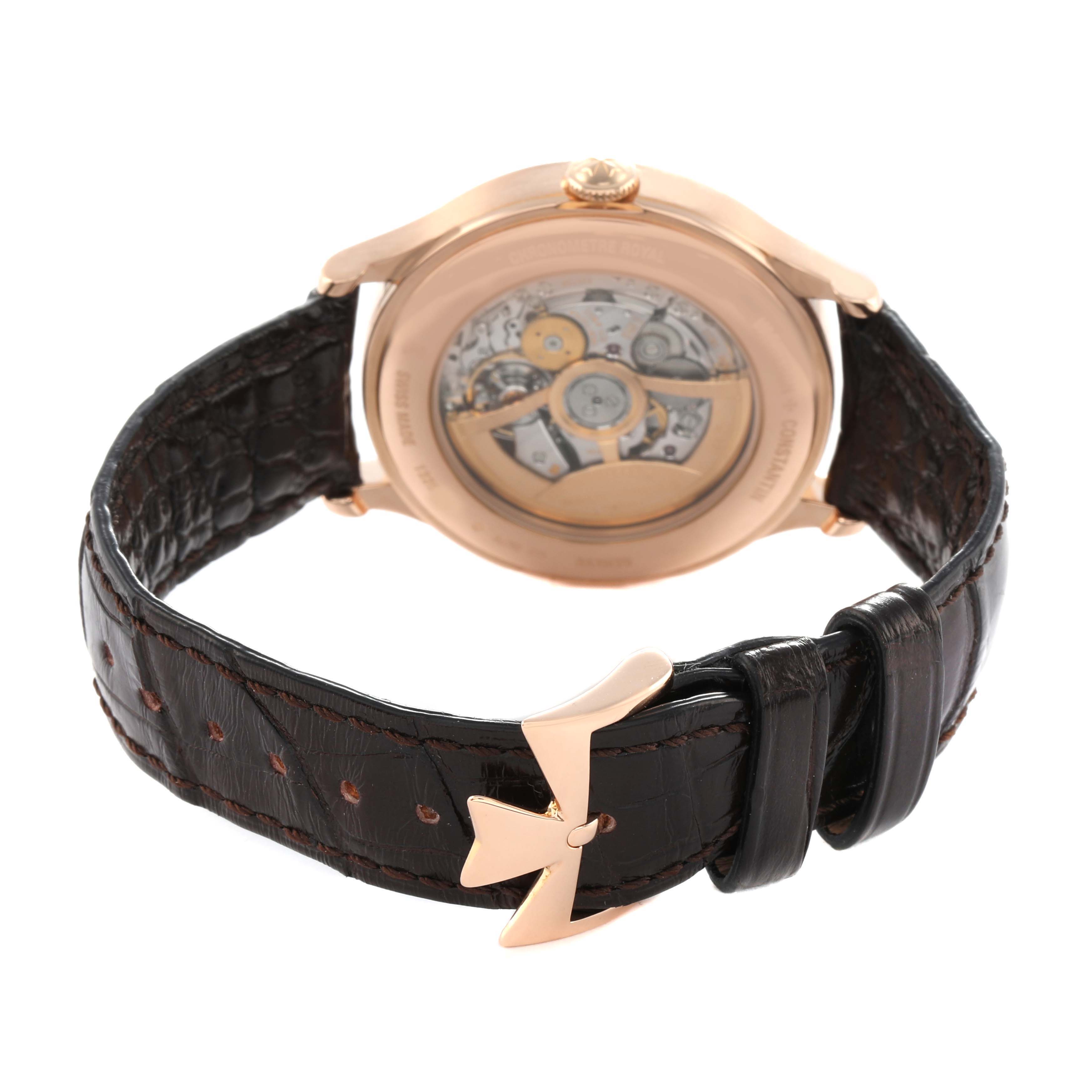 The Vacheron Constantin Historiques 86122 Men's Rose Gold White Dial model is shown from the back, highlighting the case back and movement through a transparent case.