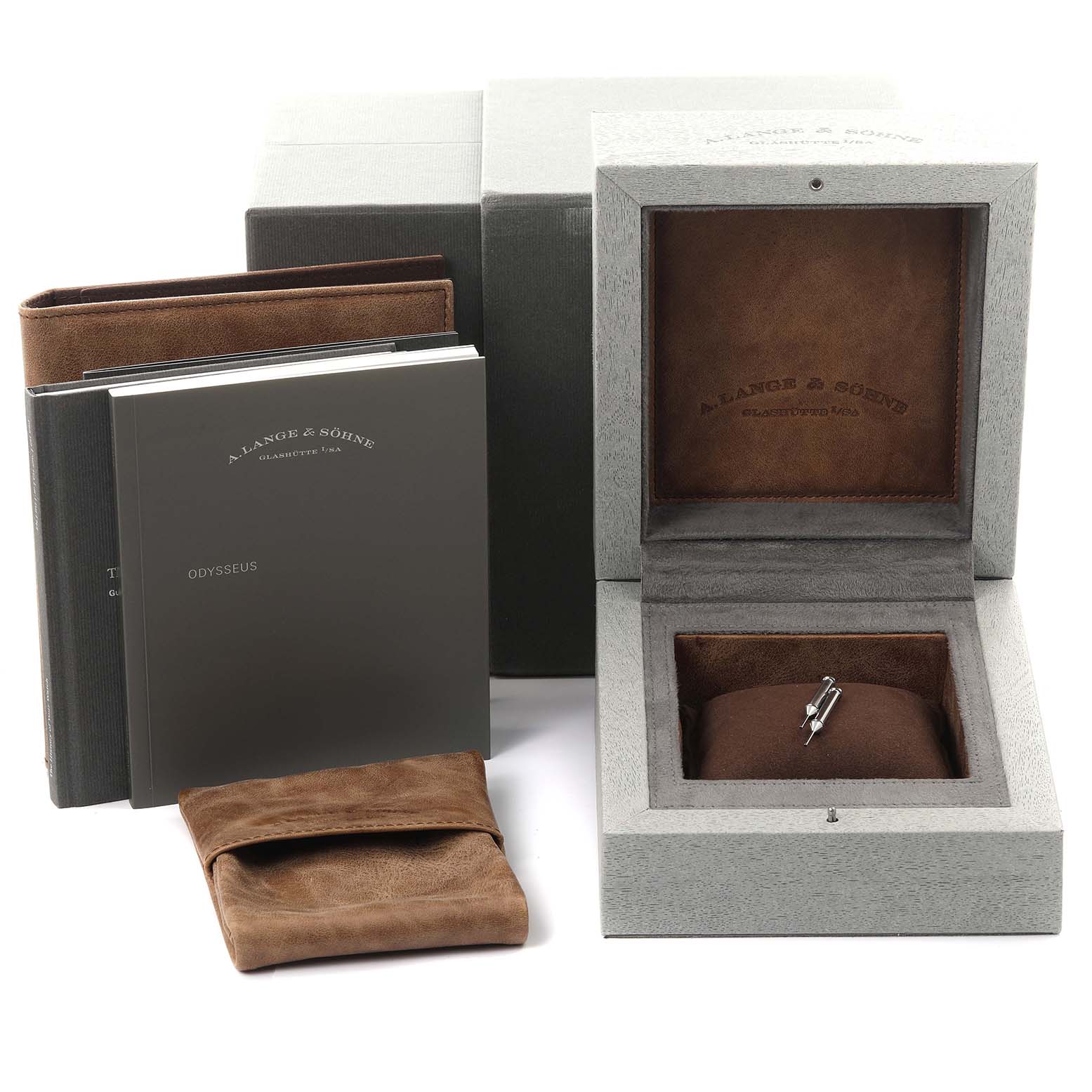 The image shows an A. Lange & Sohne Odysseus 363.068 Men's White Gold Grey Dial watch box, booklets, and a suede pouch from a frontal angle.