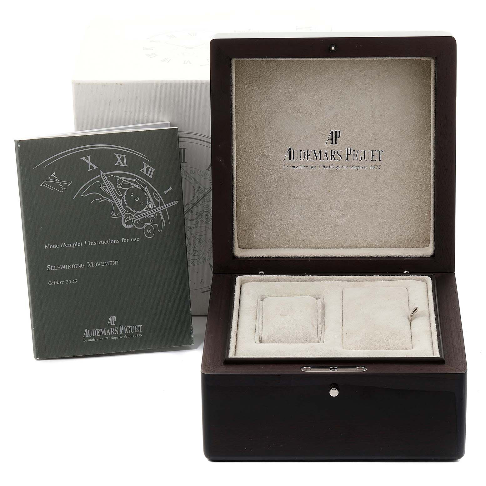 This image shows the Audemars Piguet Millenary 77301ST.ZZ.D009CR.01 Women's Stainless Steel Silver Dial 77301ST.ZZ.D009CR.01 Women's Stainless Steel Silver Dial watch box and instruction manual at a front angle.