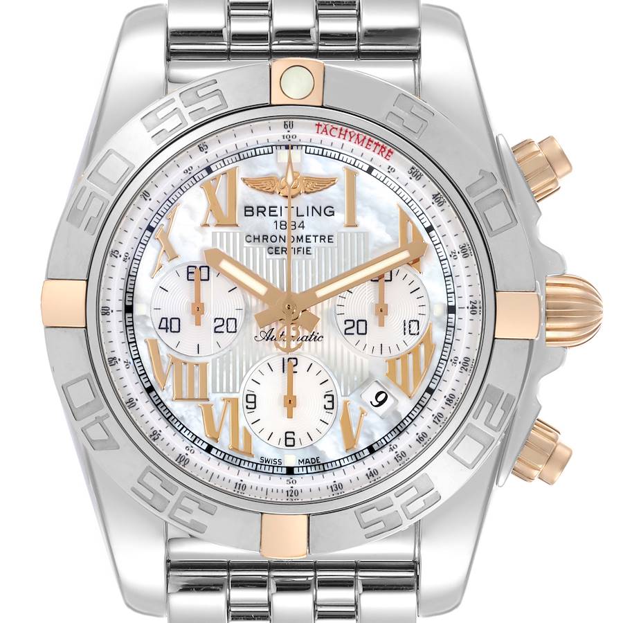 The Breitling Chronomat watch is shown from a frontal angle, featuring its bezel, dial, and partial bracelet.