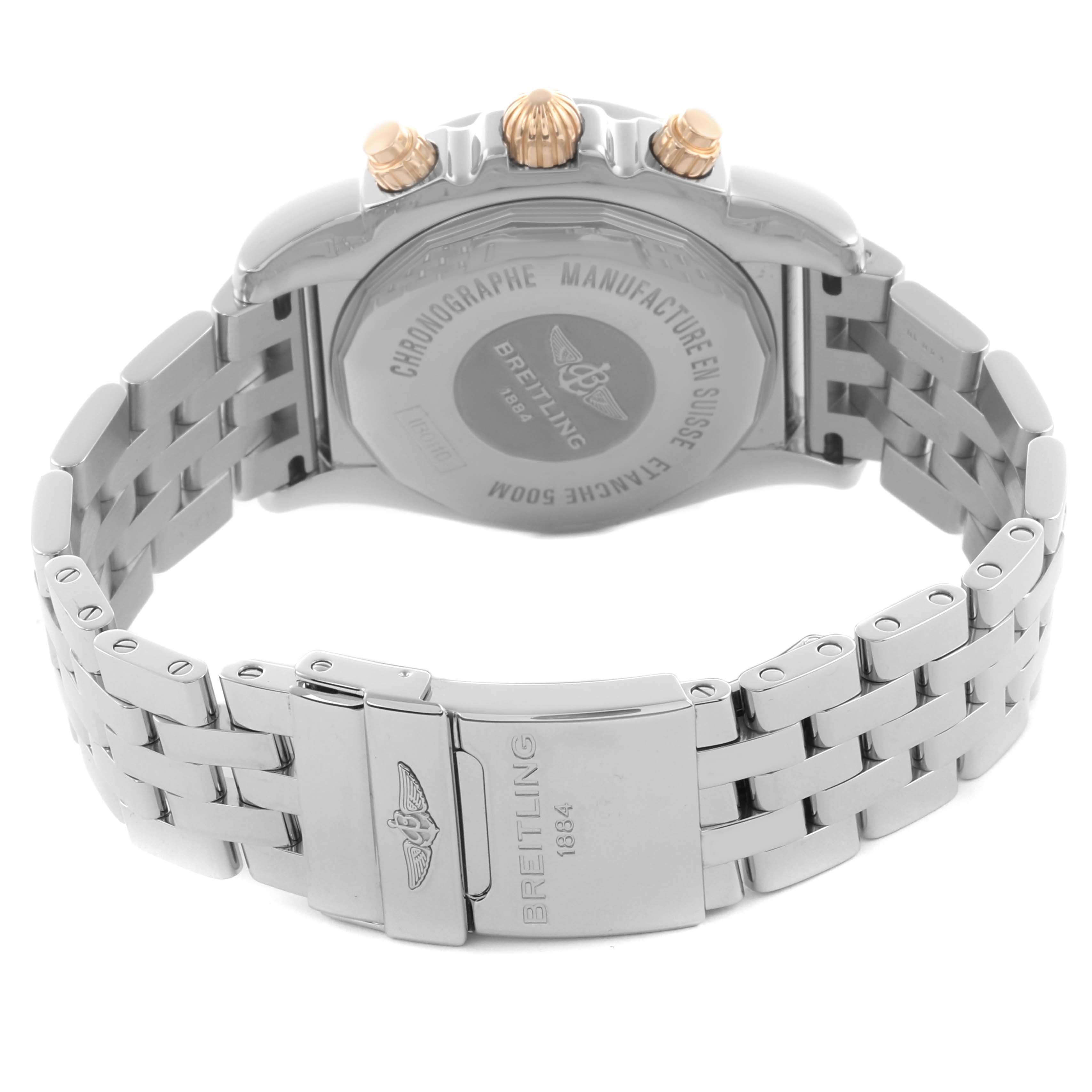 The image shows the back and clasp of a Breitling Chronomat IB0110 Men's Steel and Gold (two tone) Mother of Pearl Dial IB0110 Men's Steel and Gold (two tone) Mother of Pearl Dial watch with focus on the bracelet and crown.