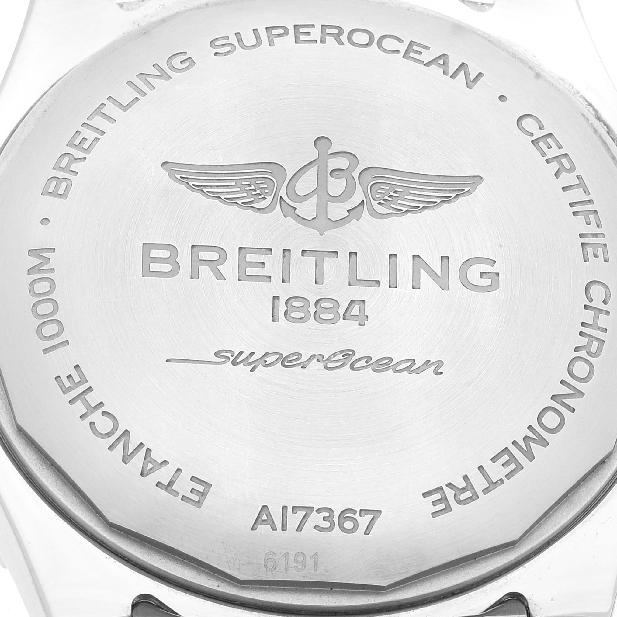 This image shows the back case of a Breitling Superocean A17367 Men's Stainless Steel Blue Dial A17367 Men's Stainless Steel Blue Dial watch, featuring engravings and model information.