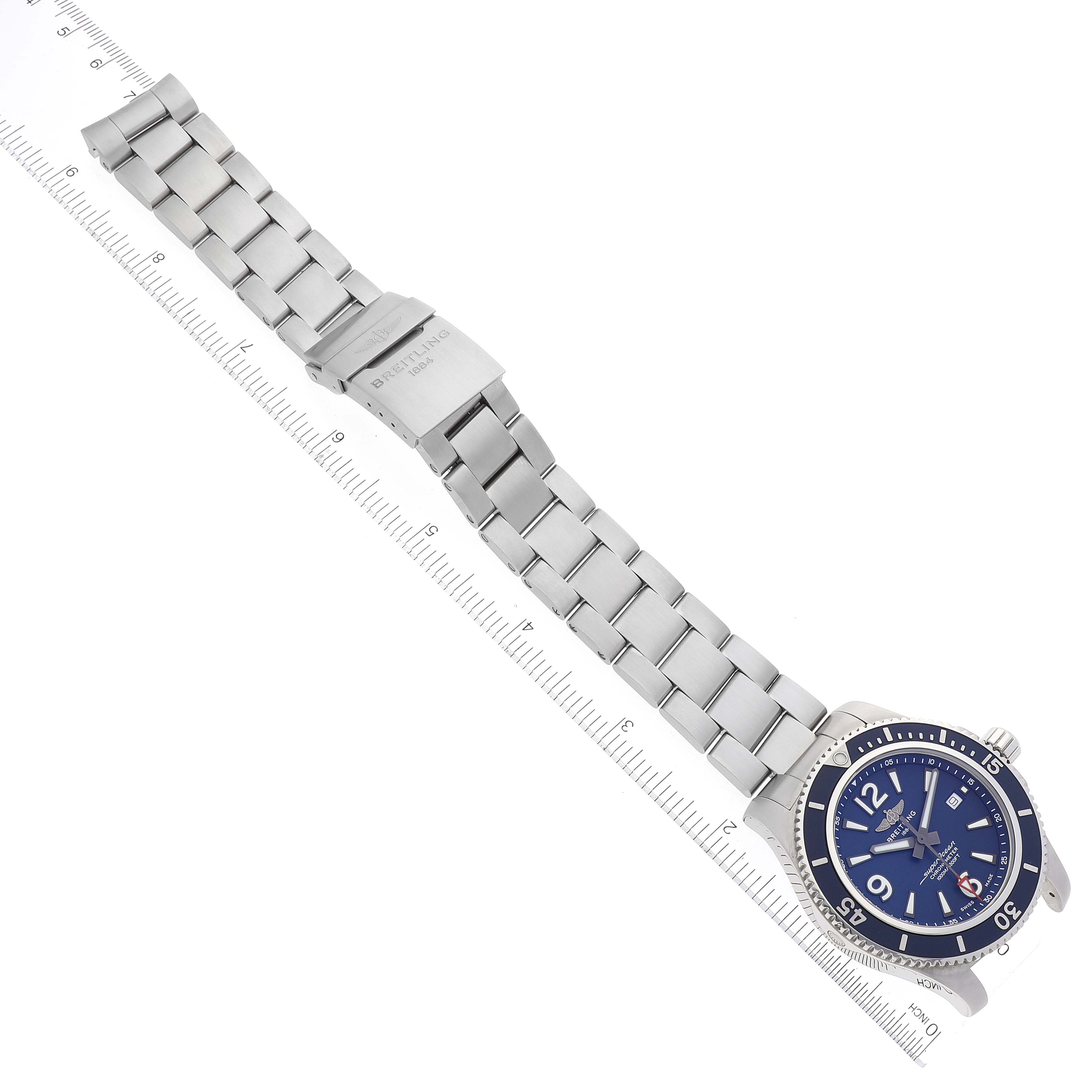 The image shows a top-down view of the Breitling Superocean A17367 Men's Stainless Steel Blue Dial A17367 Men's Stainless Steel Blue Dial watch, highlighting the stainless steel bracelet and blue dial.