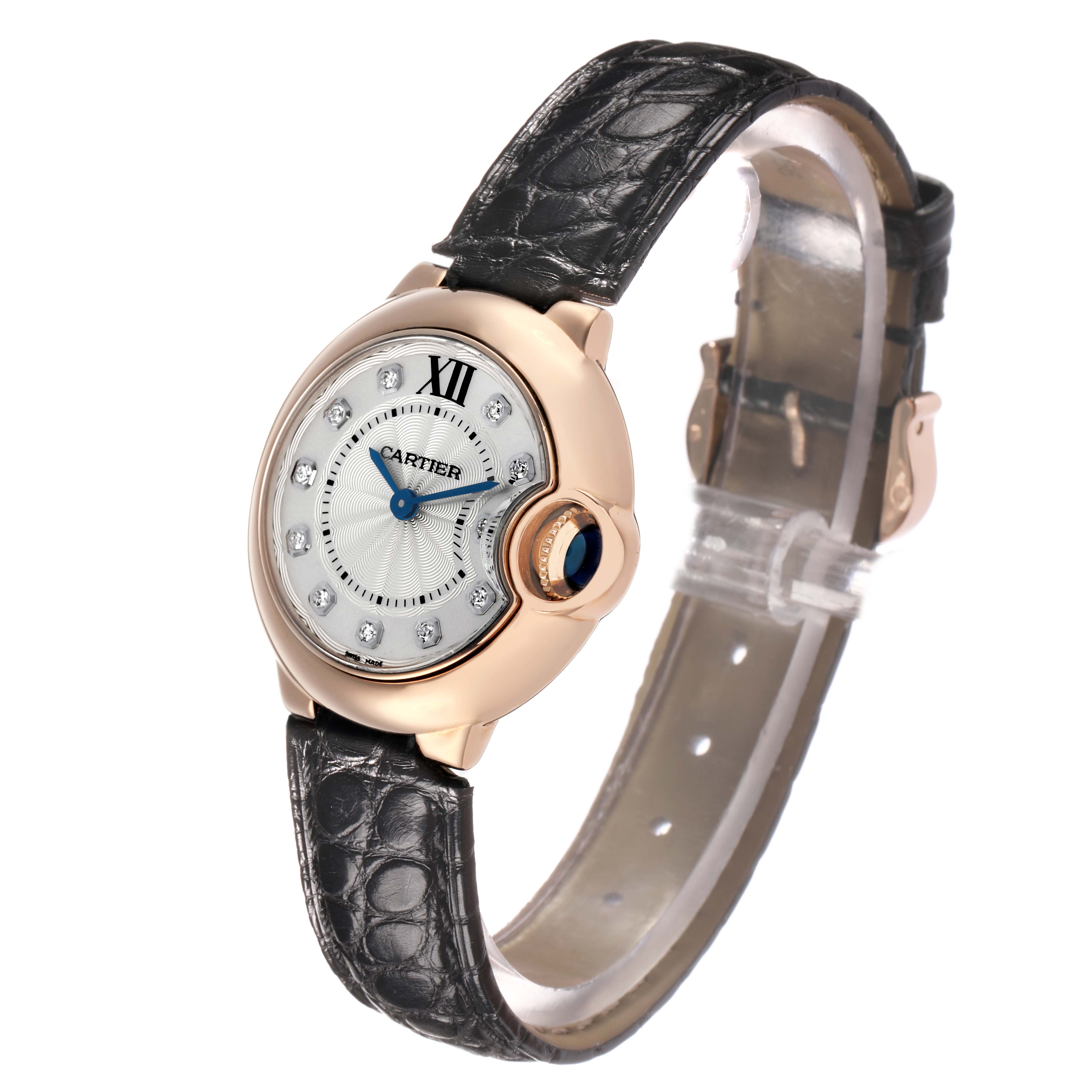 The Cartier Ballon Bleu WE902050 Women's Rose Gold Silver Dial watch is shown at an angle highlighting the face, crown, case, and leather strap.