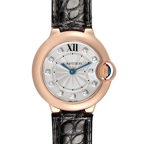 The Cartier Ballon Bleu WE902050 Women's Rose Gold Silver Dial watch is shown from the front, displaying its round silver dial, rose gold casing, and leather strap.