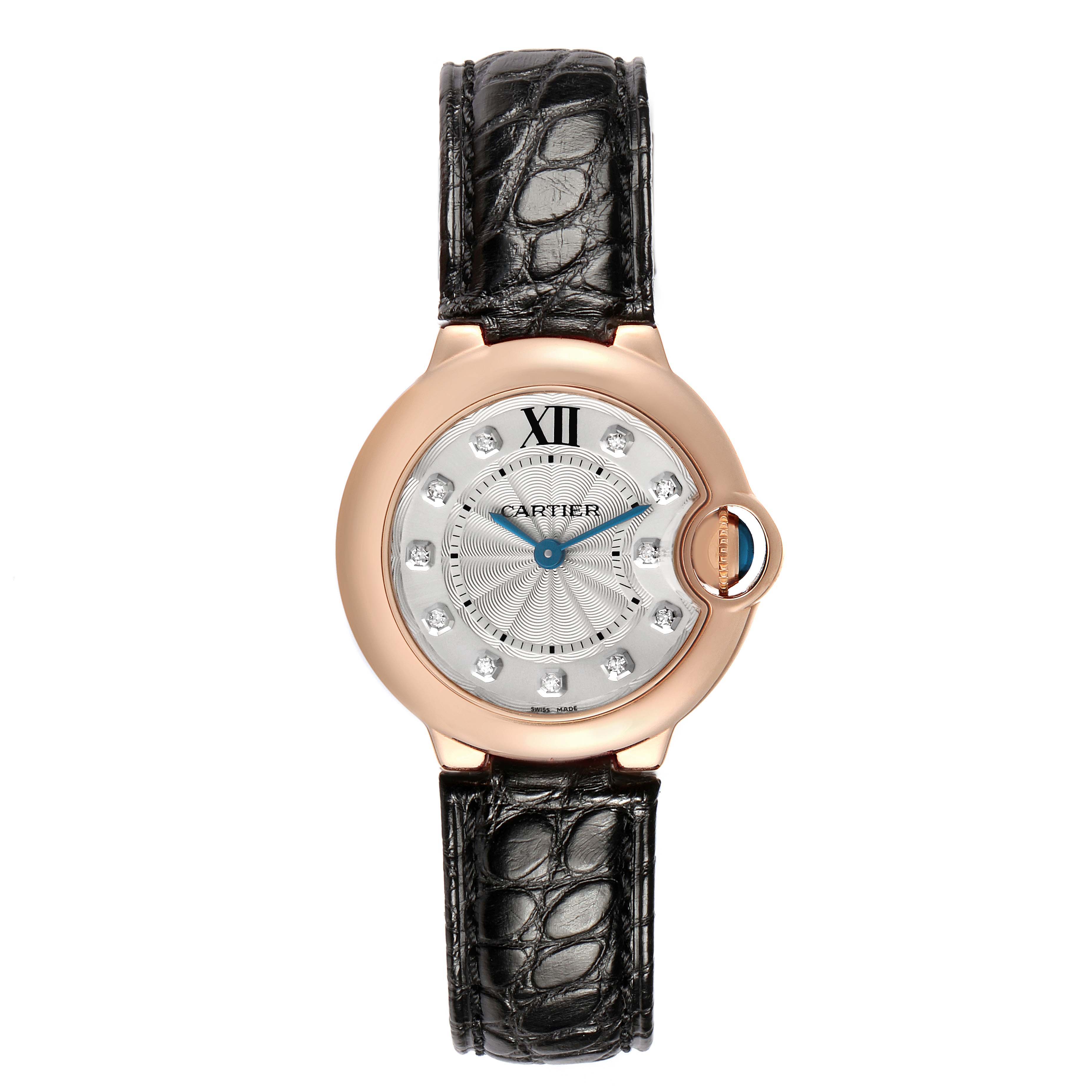 The Cartier Ballon Bleu WE902050 Women's Rose Gold Silver Dial watch is shown from a top view, displaying the face, bezel, crown, and leather strap.