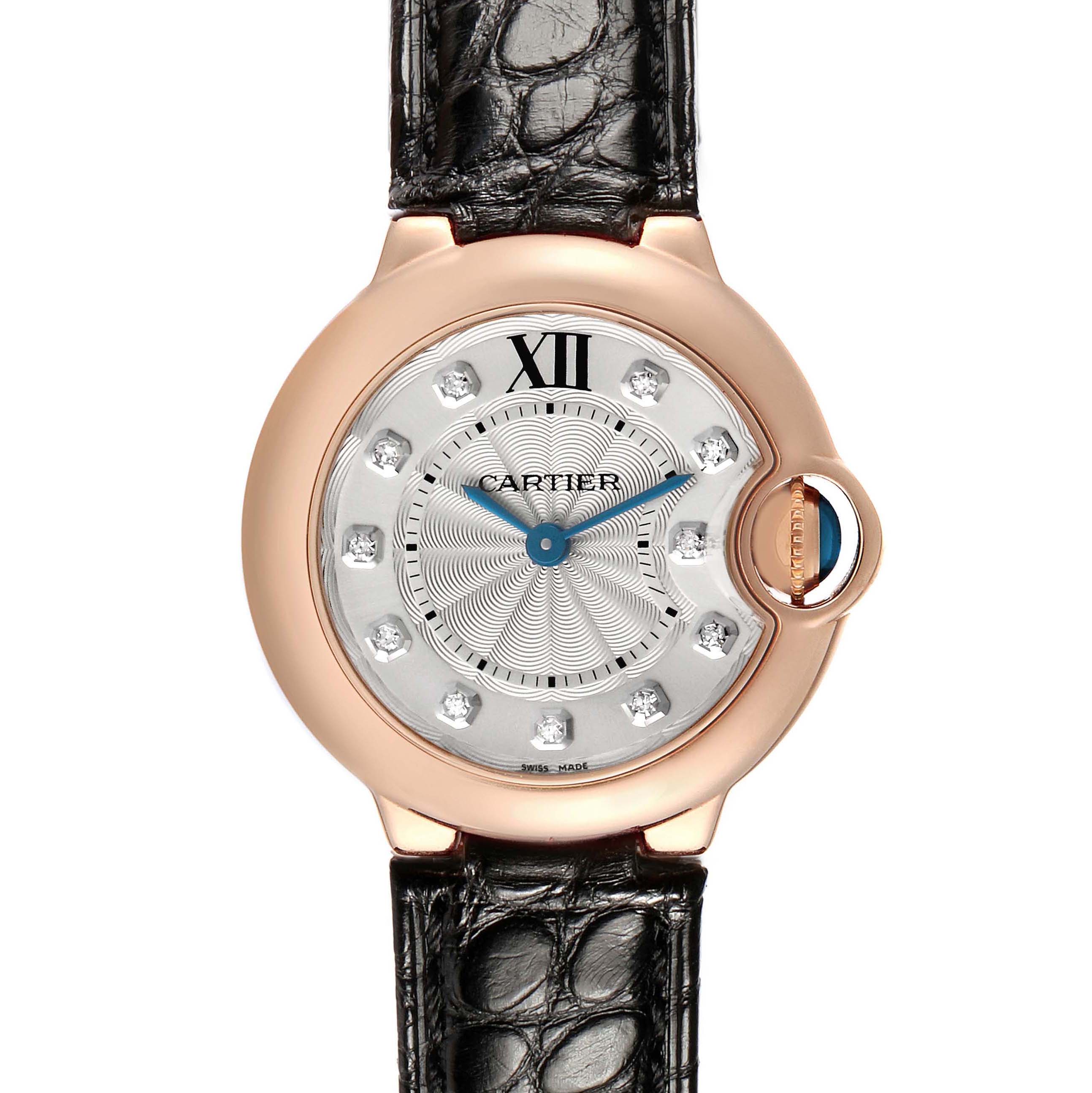 The Cartier Ballon Bleu WE902050 Women's Rose Gold Silver Dial watch is displayed from the front, showing the dial, case, and part of the leather strap.