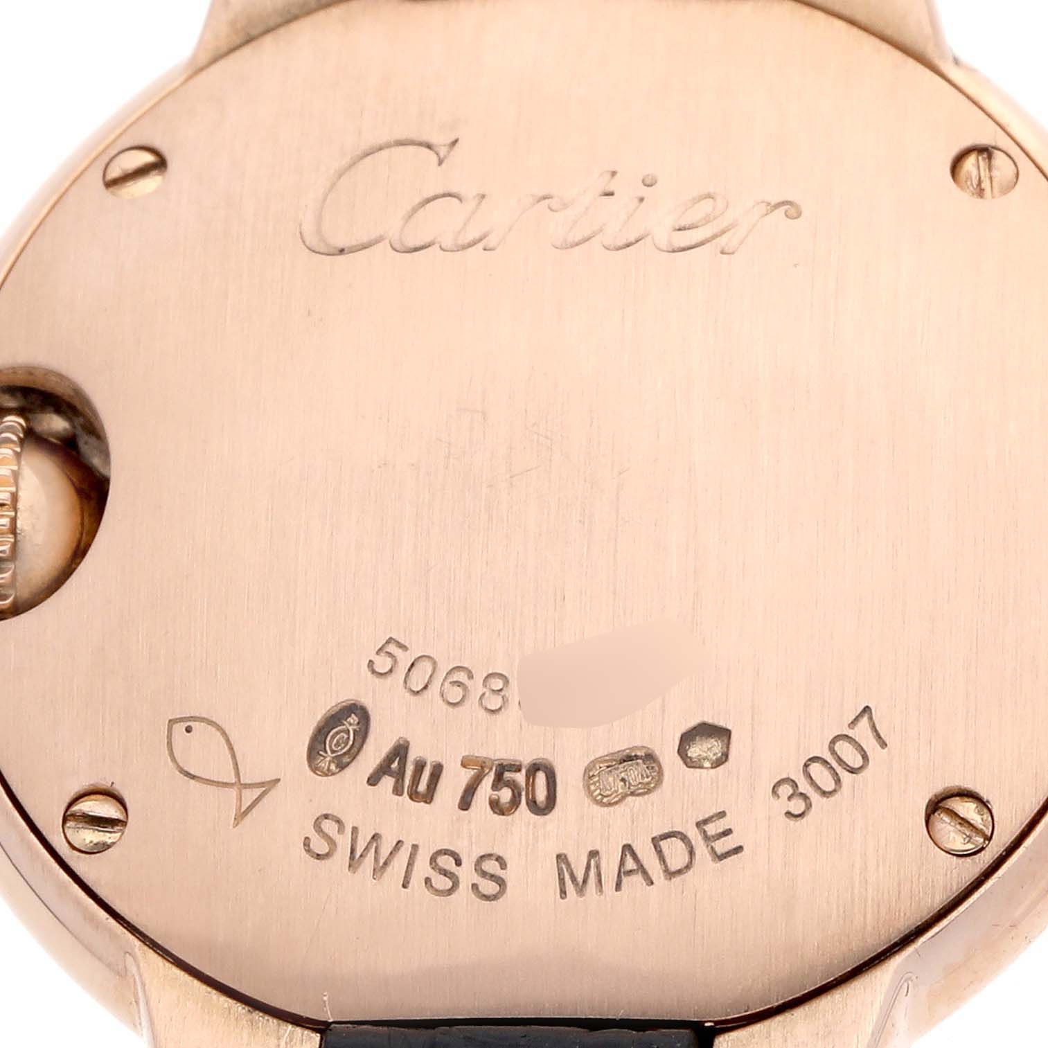 The image shows the back of a Cartier Ballon Bleu WE902050 Women's Rose Gold Silver Dial watch with engravings and hallmarks visible.