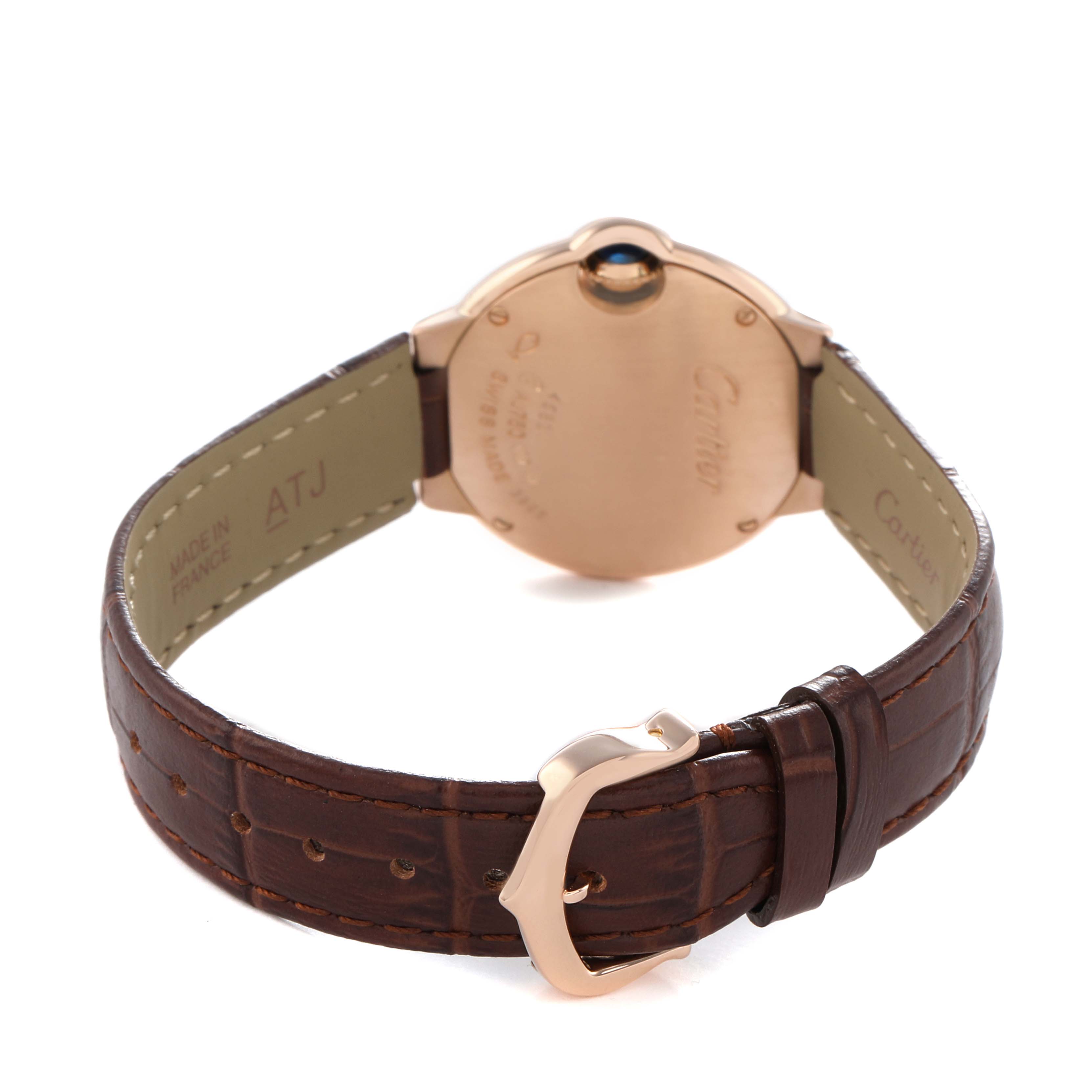 The image shows the back of a Cartier Ballon Bleu WJBB0019 Women's Rose Gold Silver Dial watch, highlighting the case back, clasp, and leather strap.