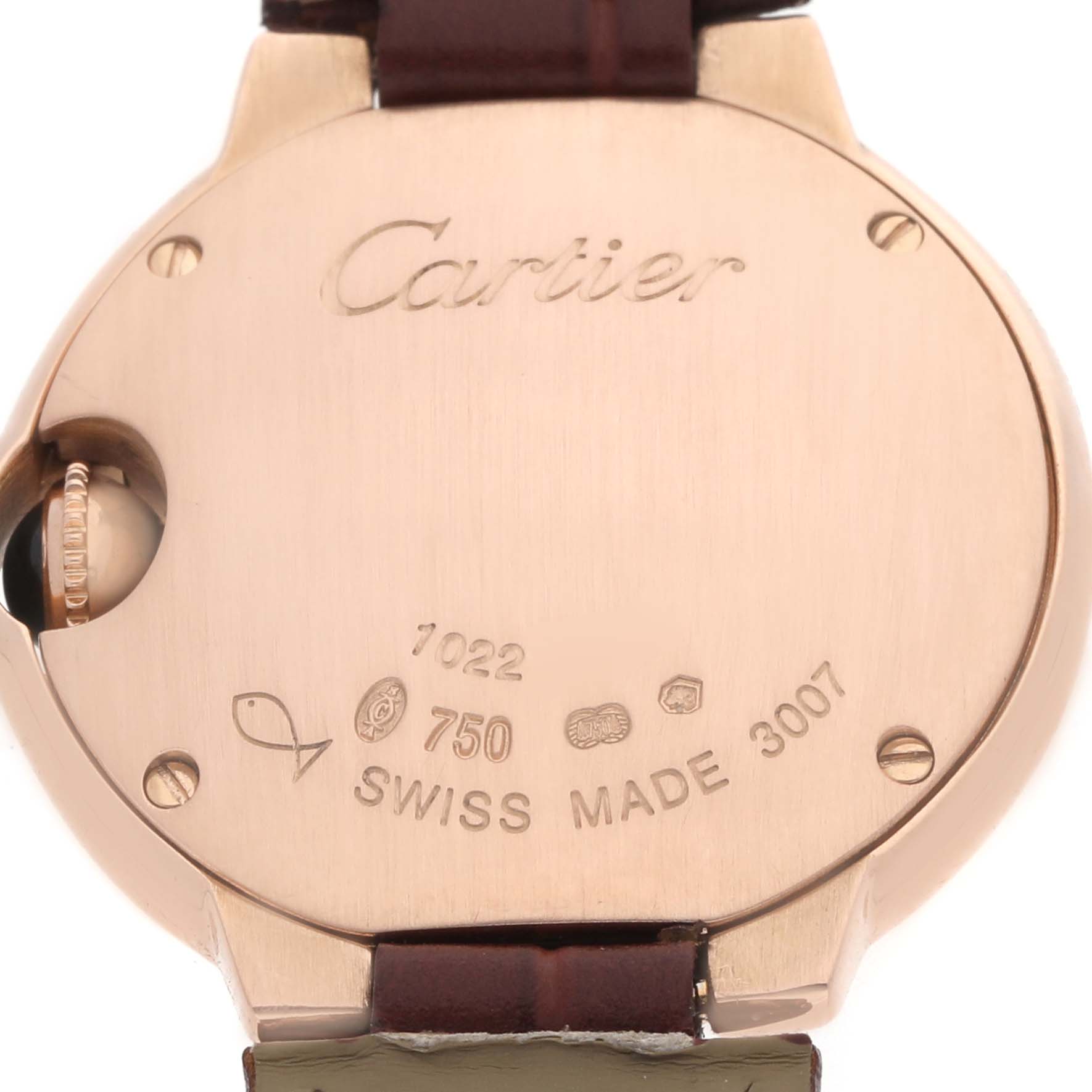 The image shows the back case of a Cartier Ballon Bleu W6900256 Women's Rose Gold Silver Dial watch, including the brand engraving and Swiss Made markings.
