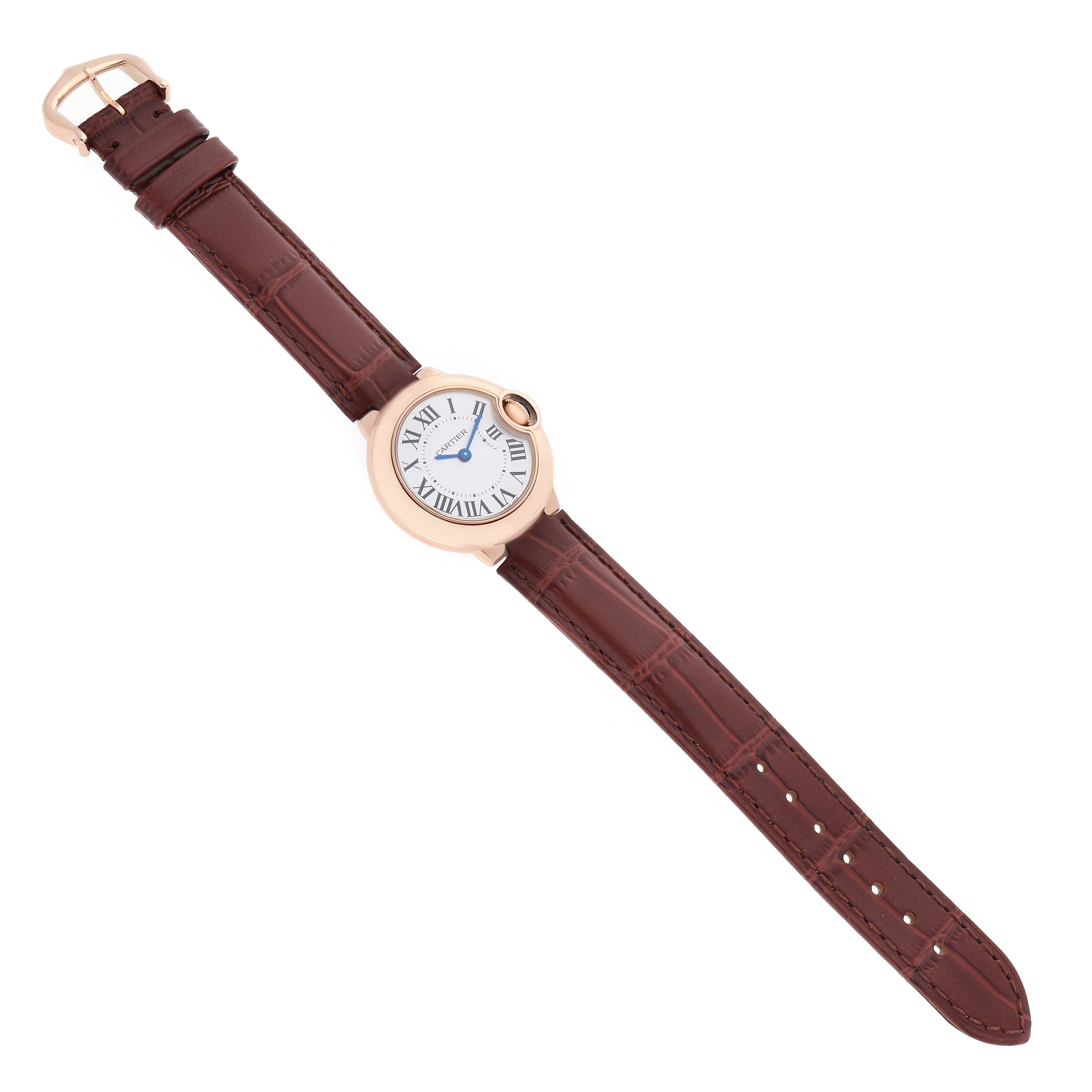 The Cartier Ballon Bleu W6900256 Women's Rose Gold Silver Dial watch is shown from a top-down angle, highlighting the round face, Roman numerals, and brown leather strap.